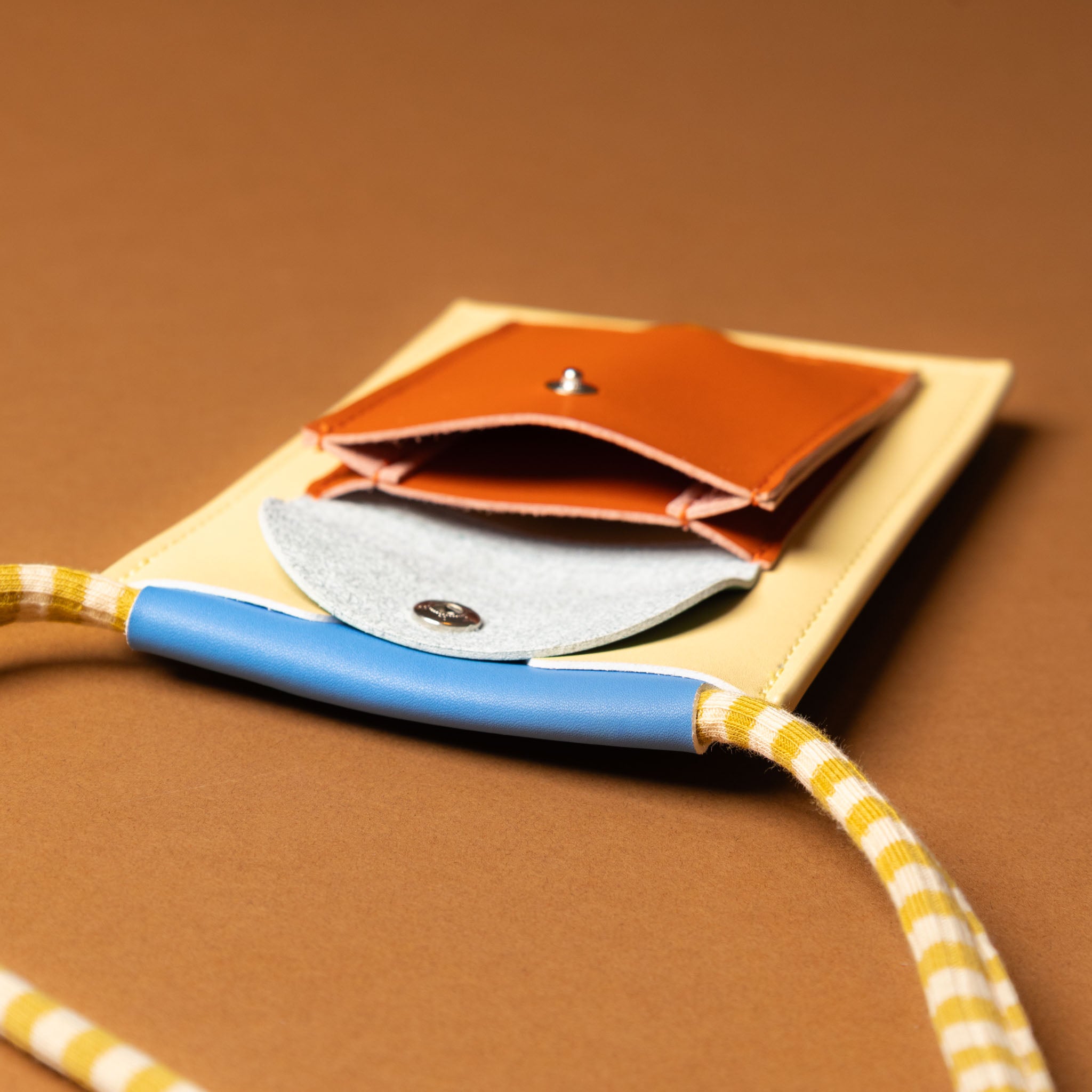 recycled-wonders-phone-pouch-sandy-beach-with-yellow-striped-strap-open-front-pocket