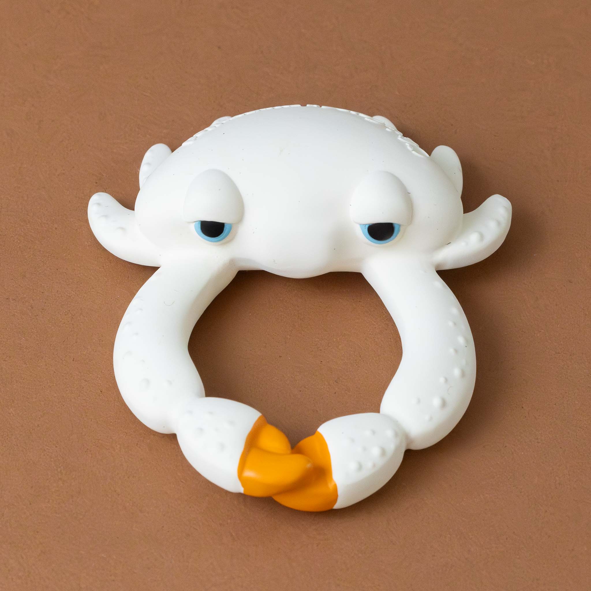 sharon-the-crab-teether-white-with-orange-claws-and-blue-eyes