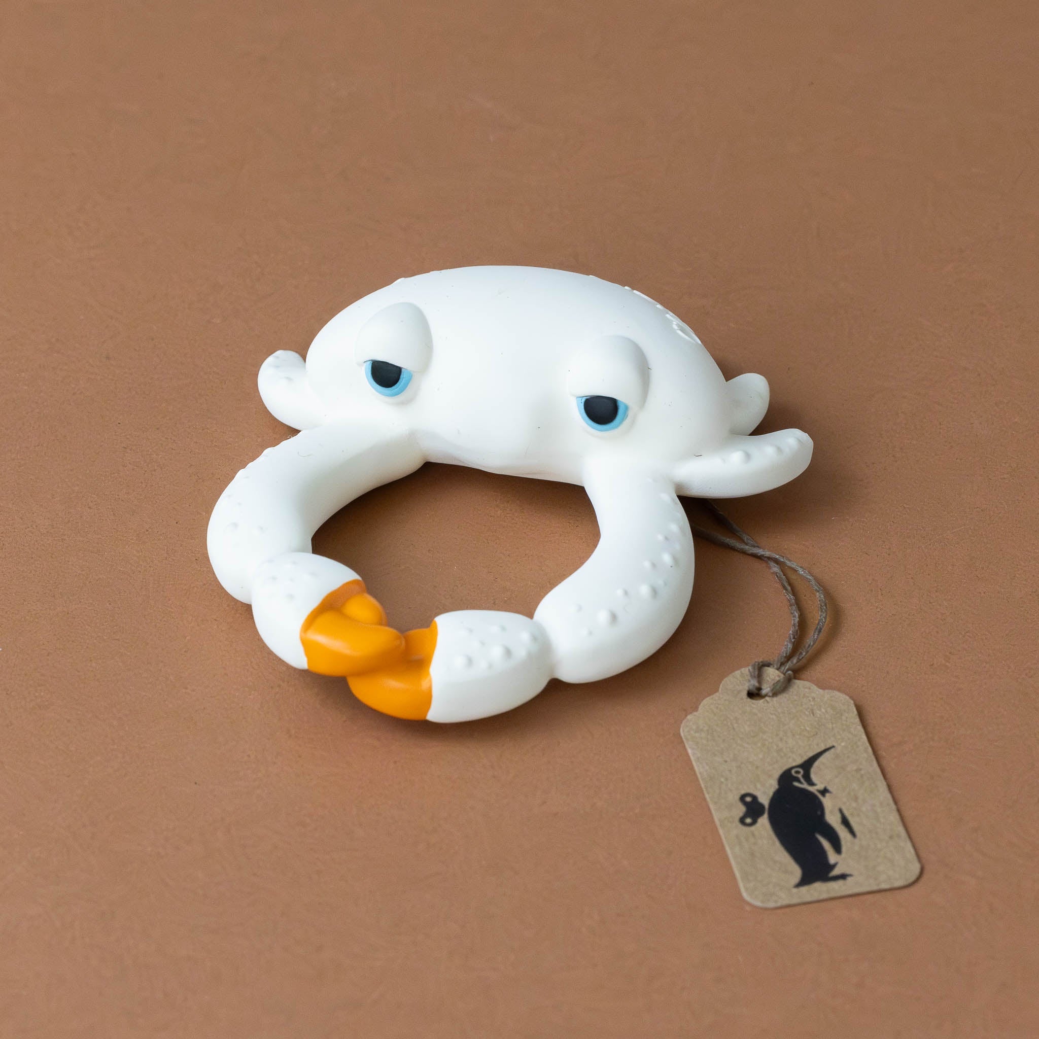 sharon-the-crab-teether-white-with-orange-claws-and-blue-eyes