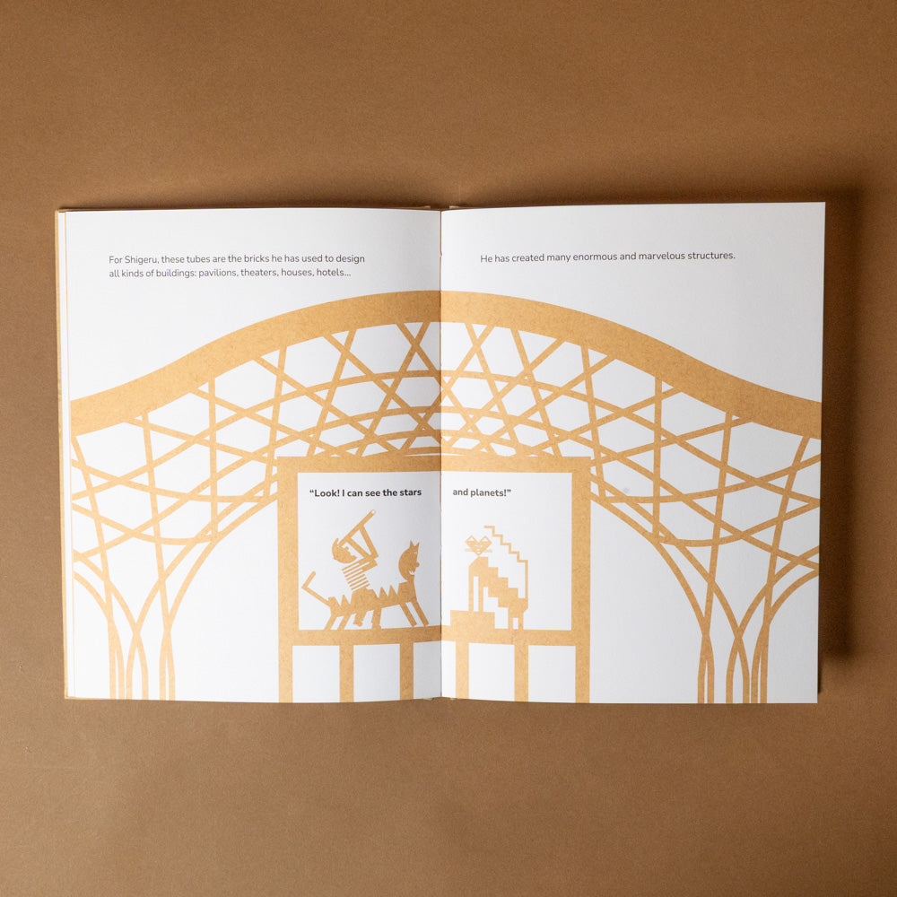 shigeru-ban-build-a-better-world Open book with gold geometric design on a brown background