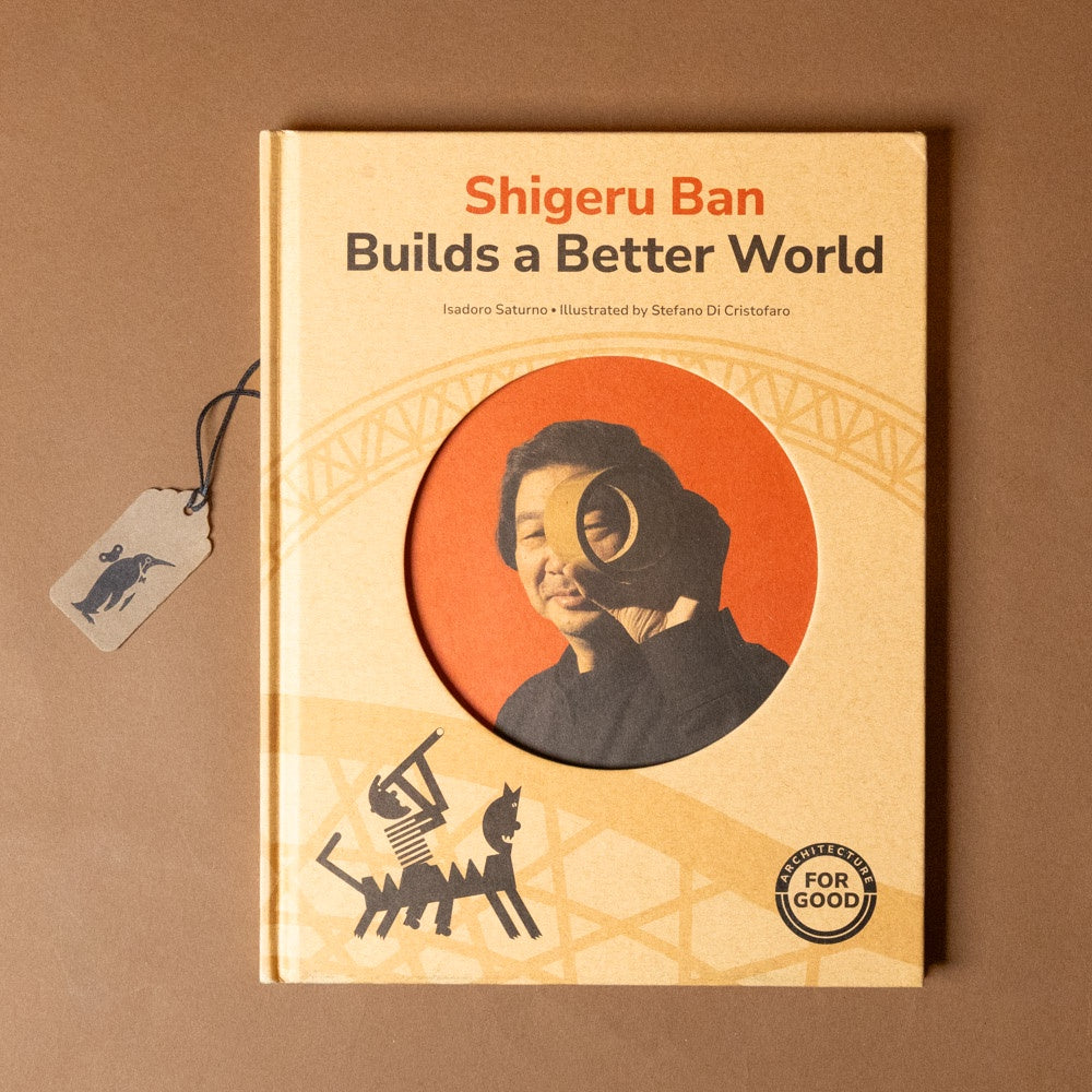 Book titled 'Shigeru Ban Builds a Better World' on a brown background