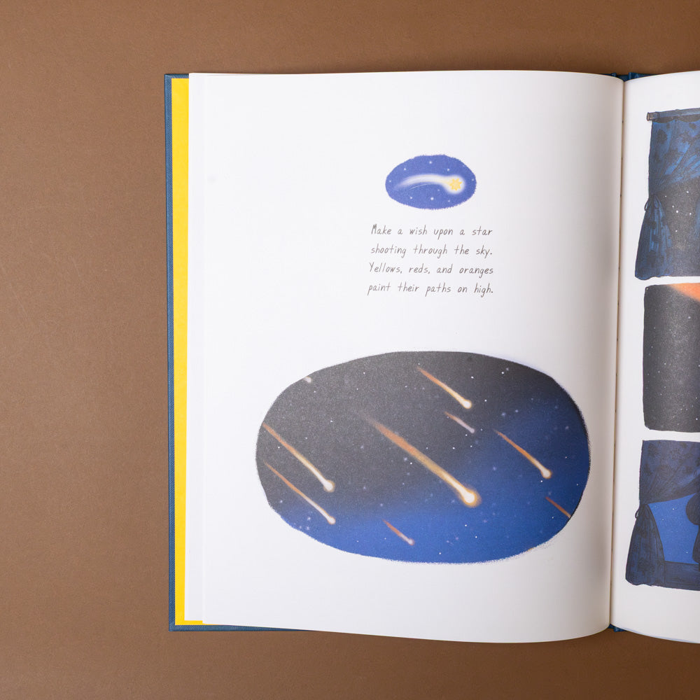 slow-down-box-set Open book with illustrations of a star and meteors on a brown background