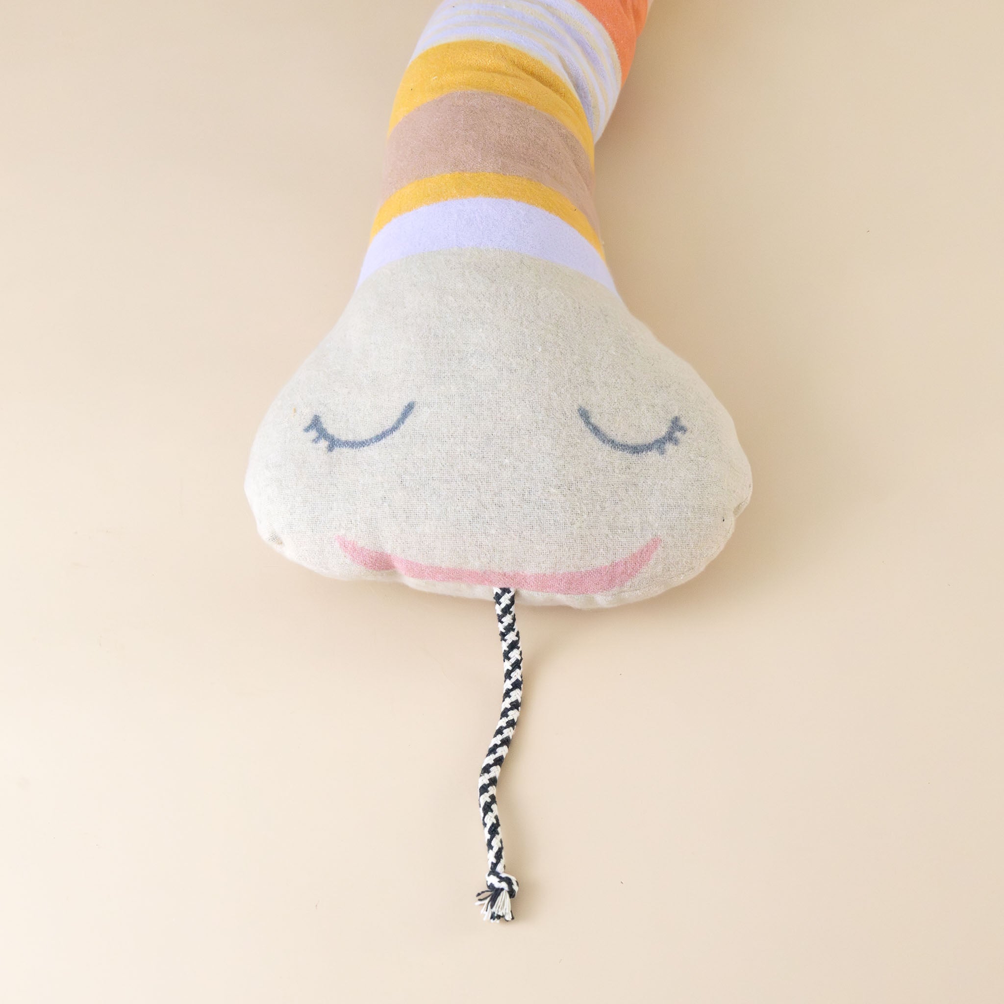 stripey-snake-nesting-cushion-pink-orange-yellow-oatmeal-rope-tongue-smiling-mouth