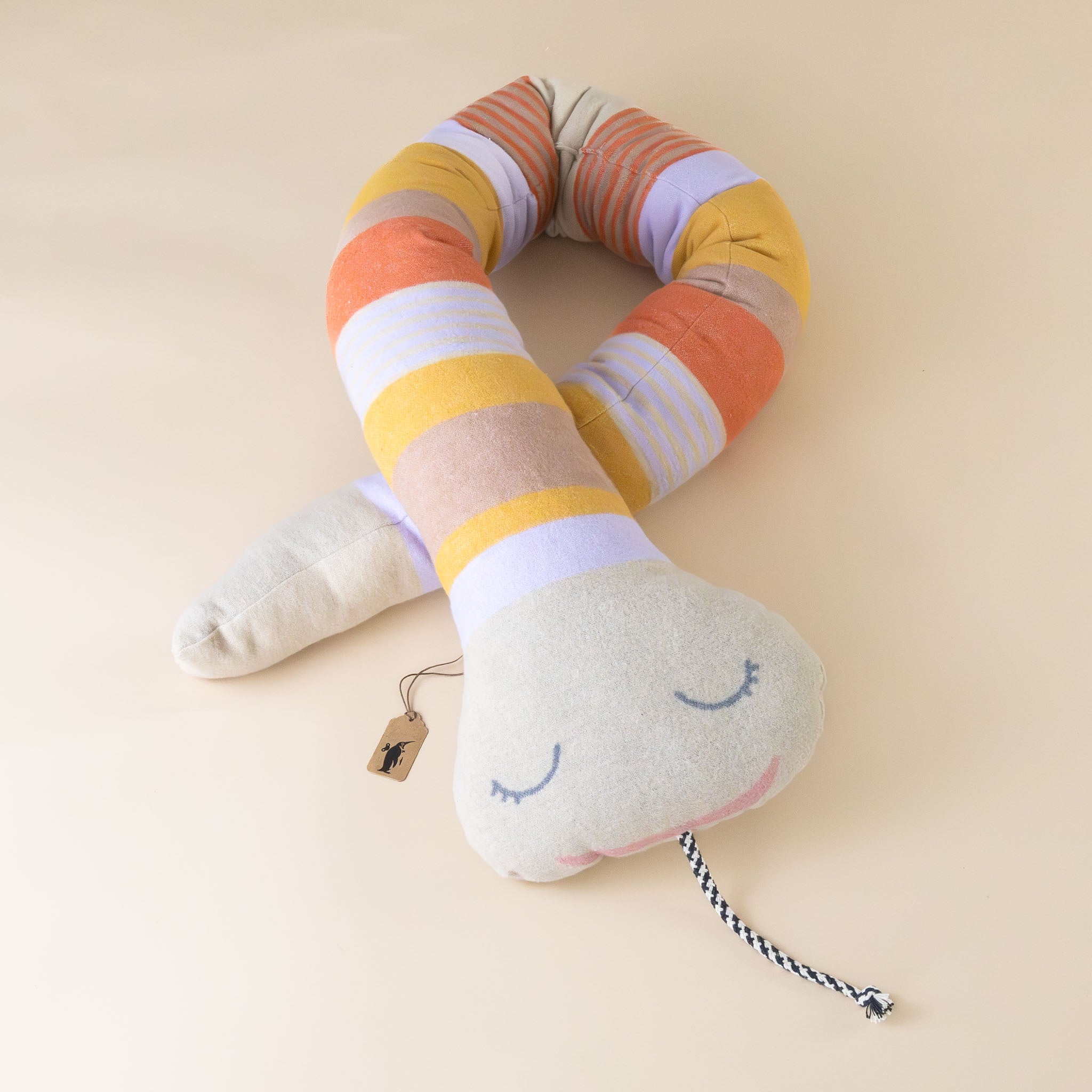 stripey-snake-nesting-cushion-pink-orange-yellow-oatmeal-rope-tongue