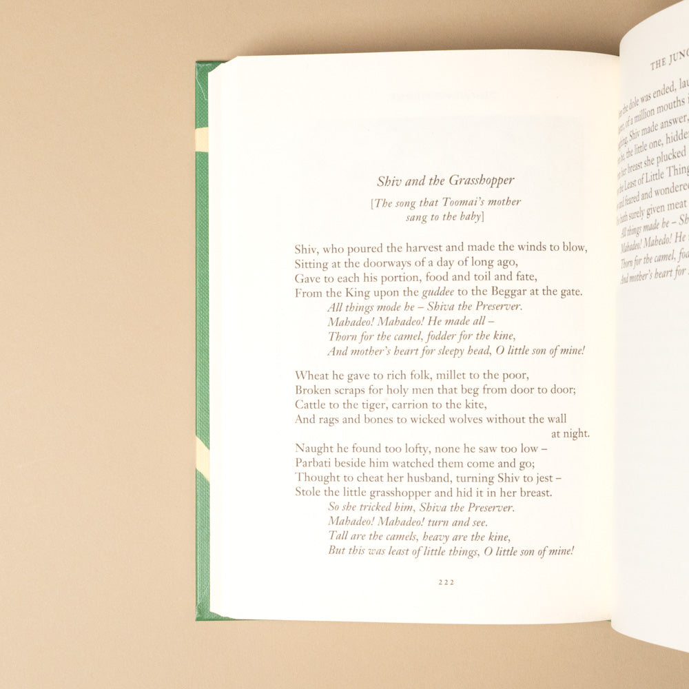 the-jungle-book Open book with text on a beige background