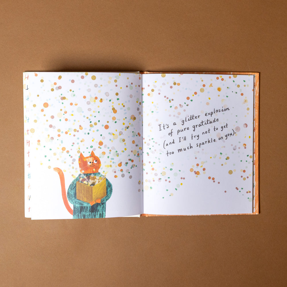 this-isnt-a-book-its-my-thanks-in-disguise Open book with a cat illustration and text on a brown background