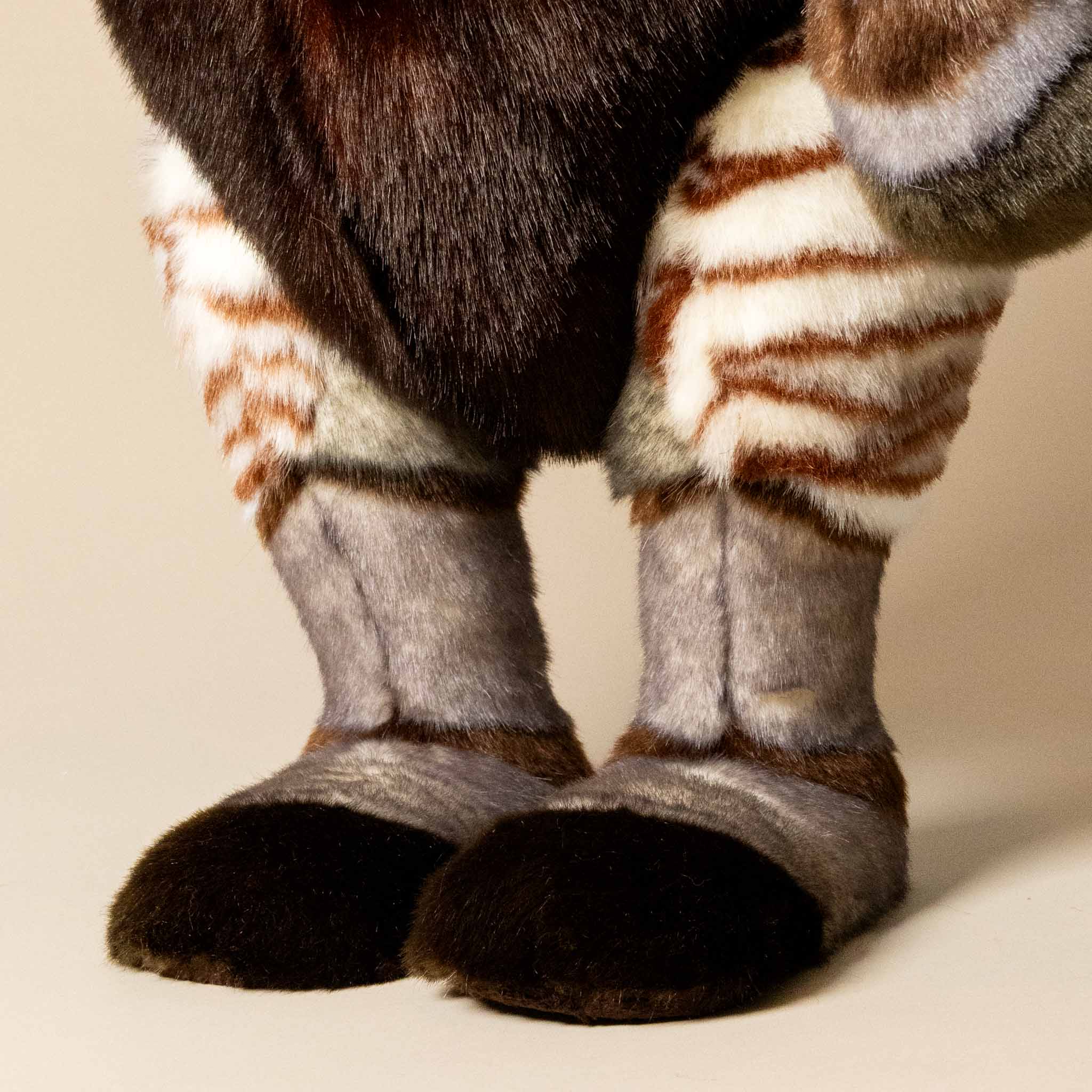 trailblazer-the-traveling-okapi-standing-stuffed-animal-legs