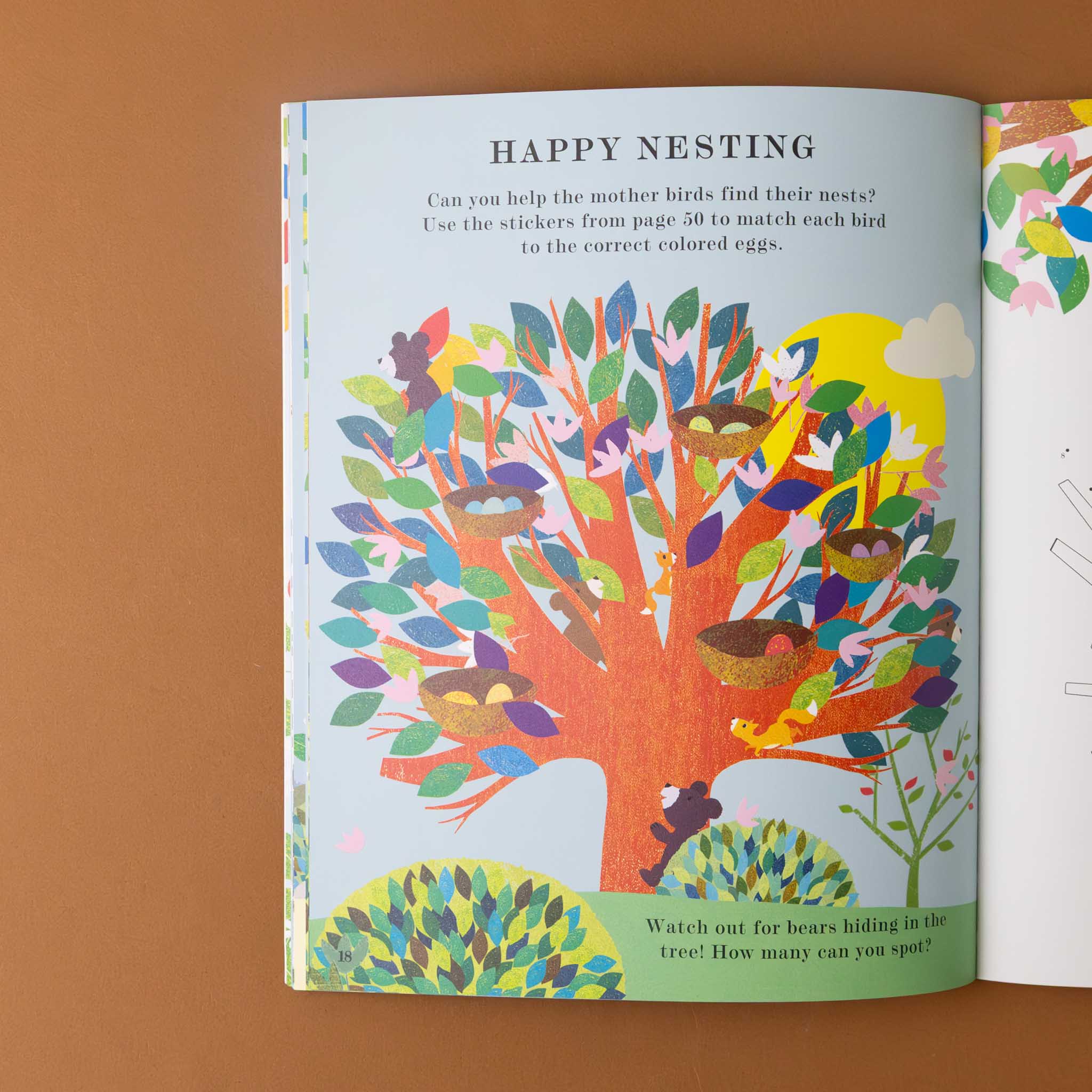 tree-a-peek-through-activity-book-illustration-of-colorful-tree-and-birds-with-title-happy-nesting-with-text