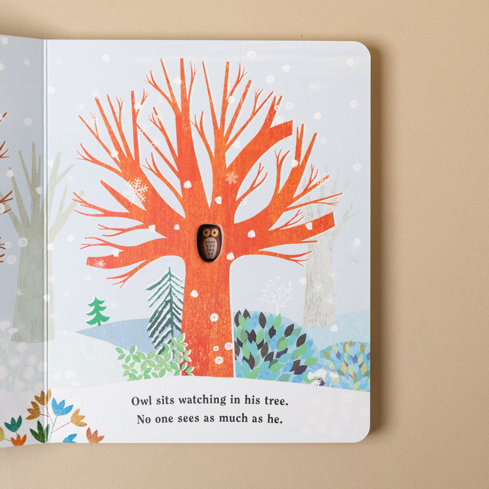 tree-a-peek-through-board-book Illustrated book page with an owl in a winter tree on a beige background