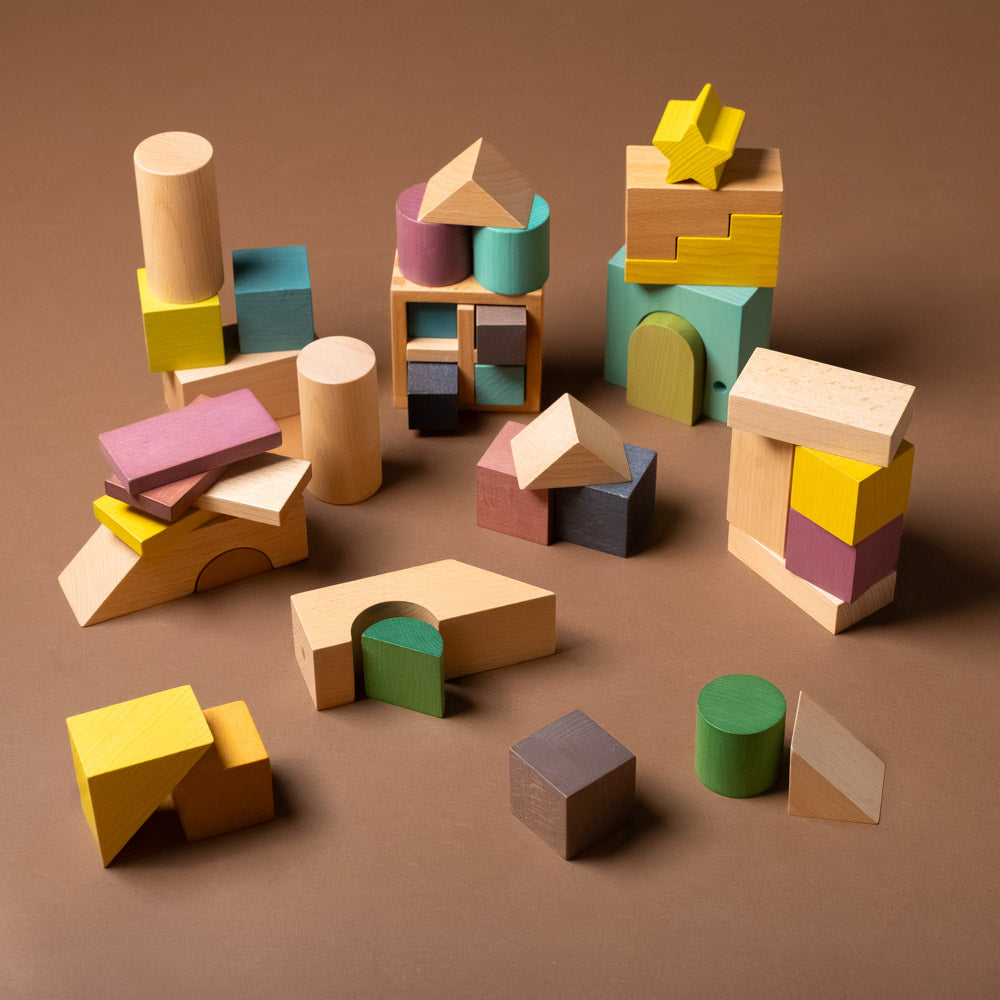 Colorful wooden blocks on a brown background