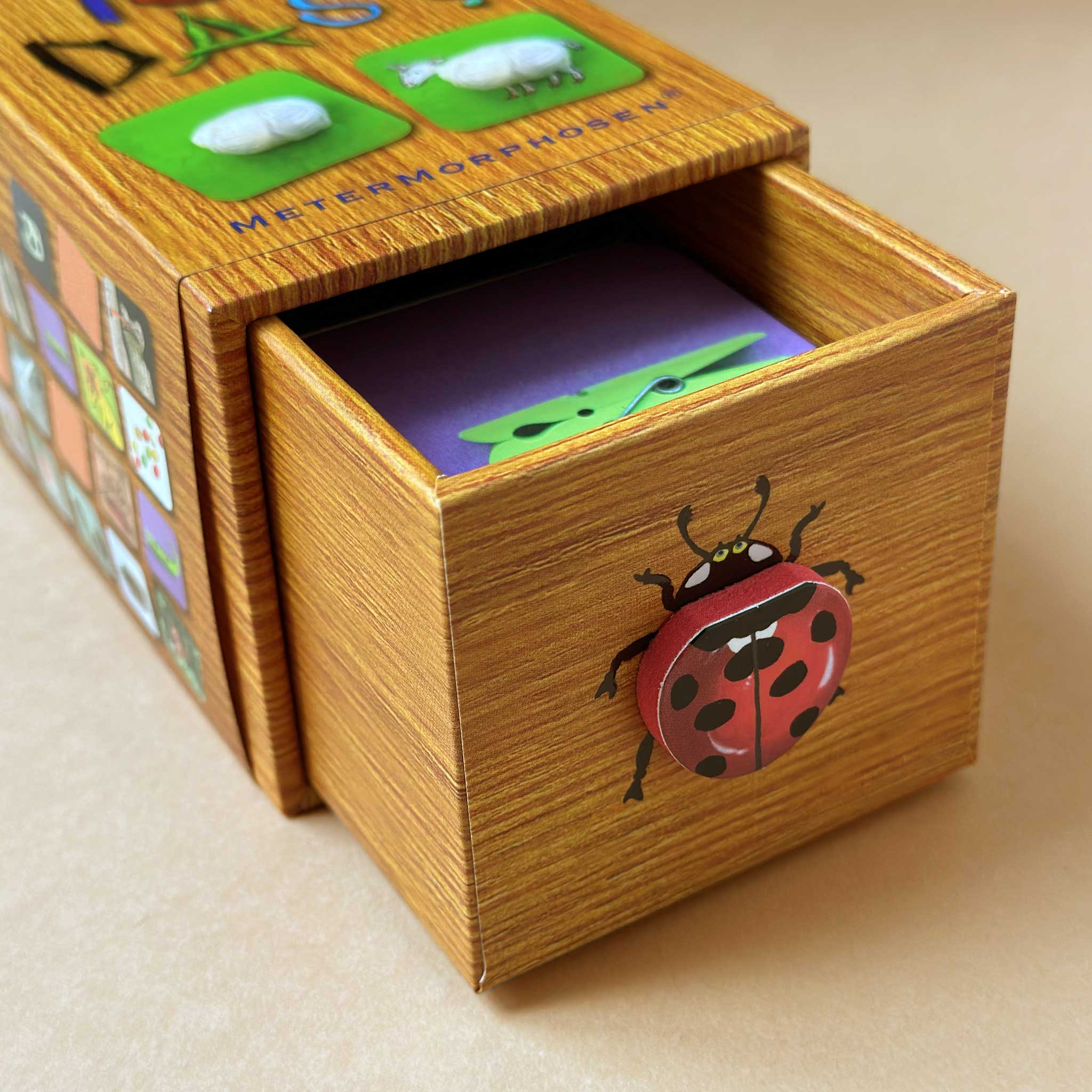 Box od Was Ist Das? Memory Game with a ladybug-pull
