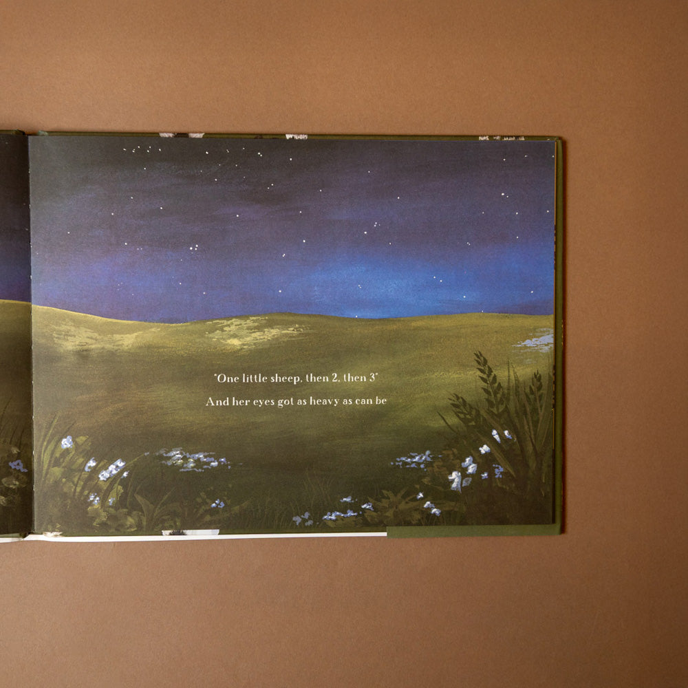 what-do-sheep-count-book-open-page-nighttime-in-a-field-with-text