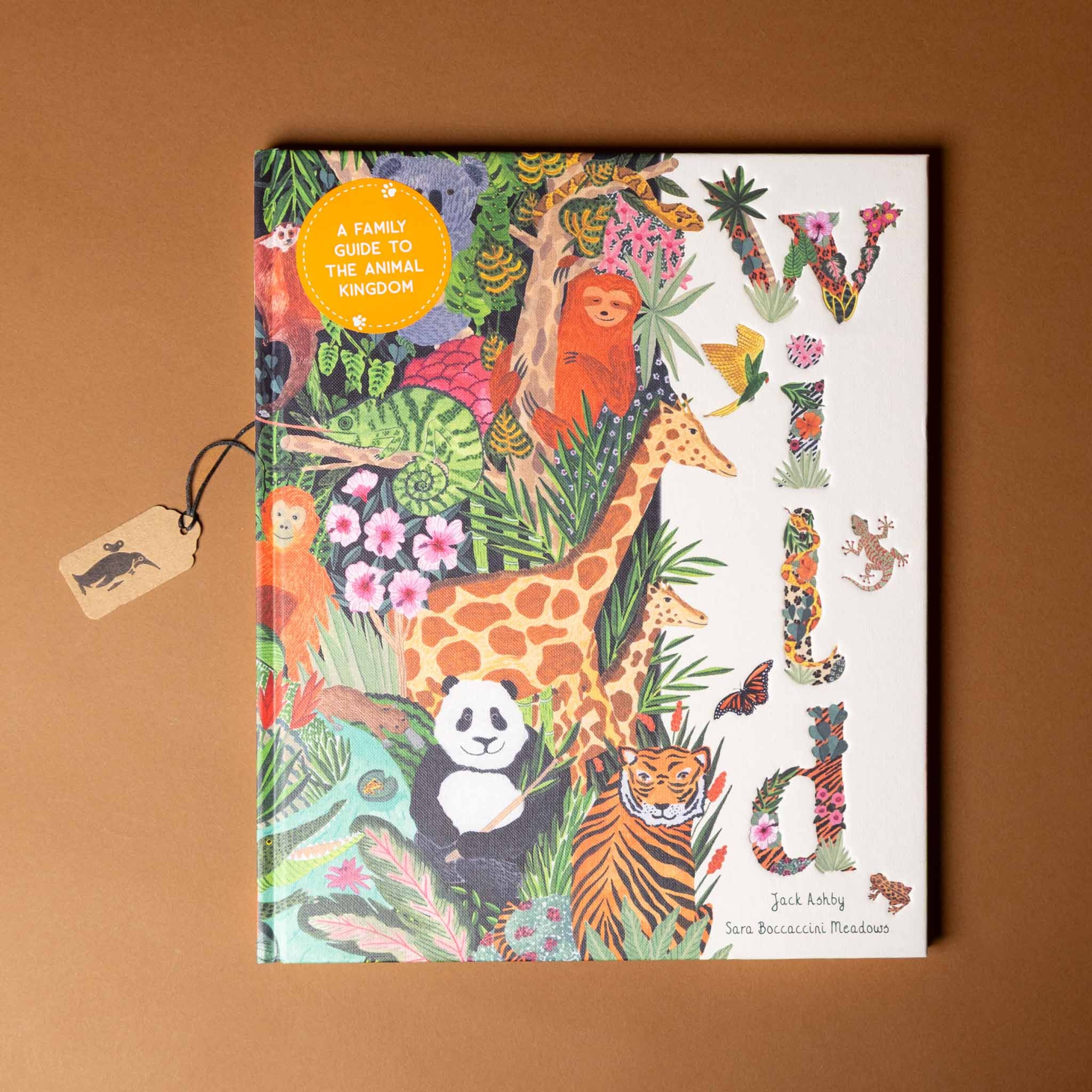 wild-a-family-guide-to-the-animal-kingdom-cover-with-panda-tiger-giraffe-and-other-animals