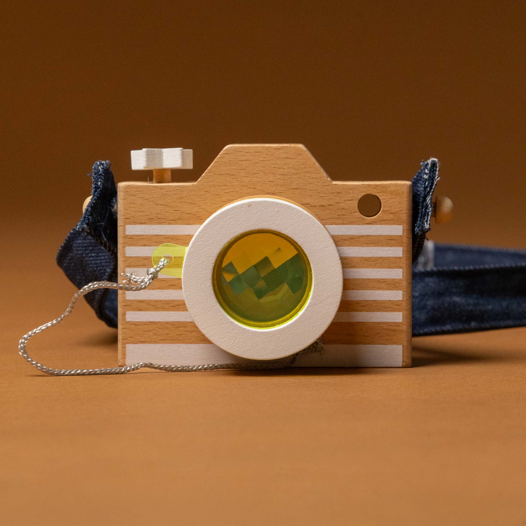 wooden-kaleidoscope-play-camera-yellow-lens-denim-strap-close