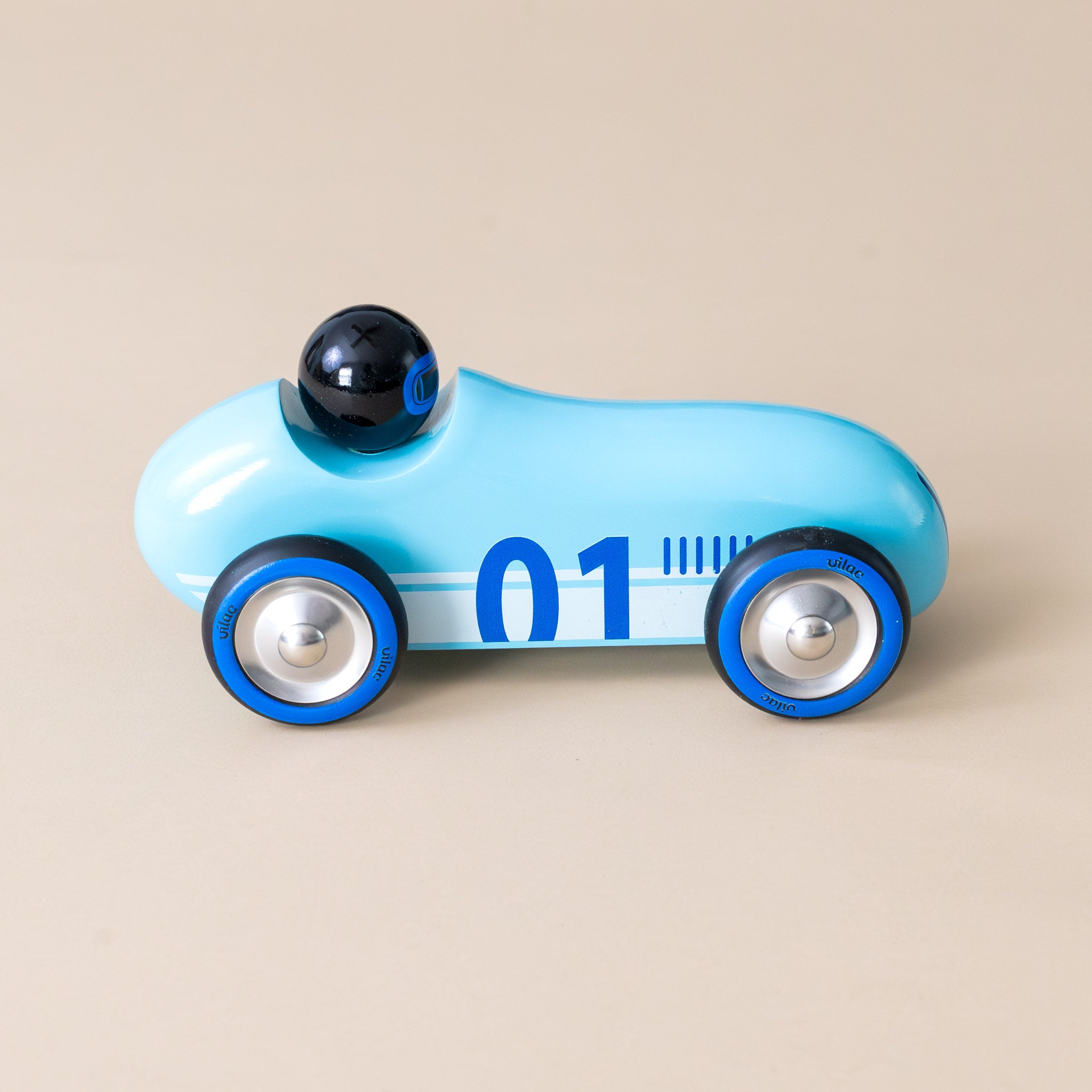 wooden-old-sport-compet-car-turquoise-blue-number-one-and-tires-side