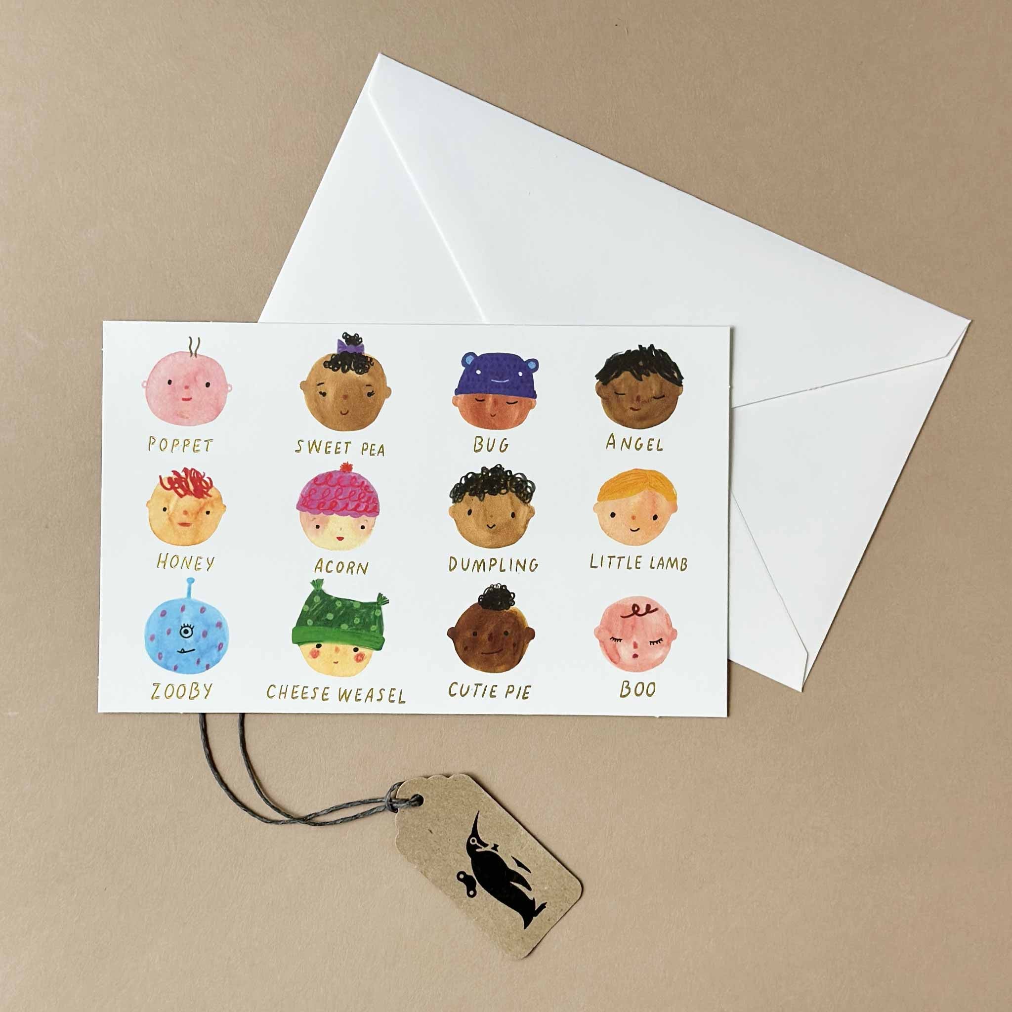 Correspondence Card Kit | Baby Face with a card showing a watercolor illustration of baby faces.