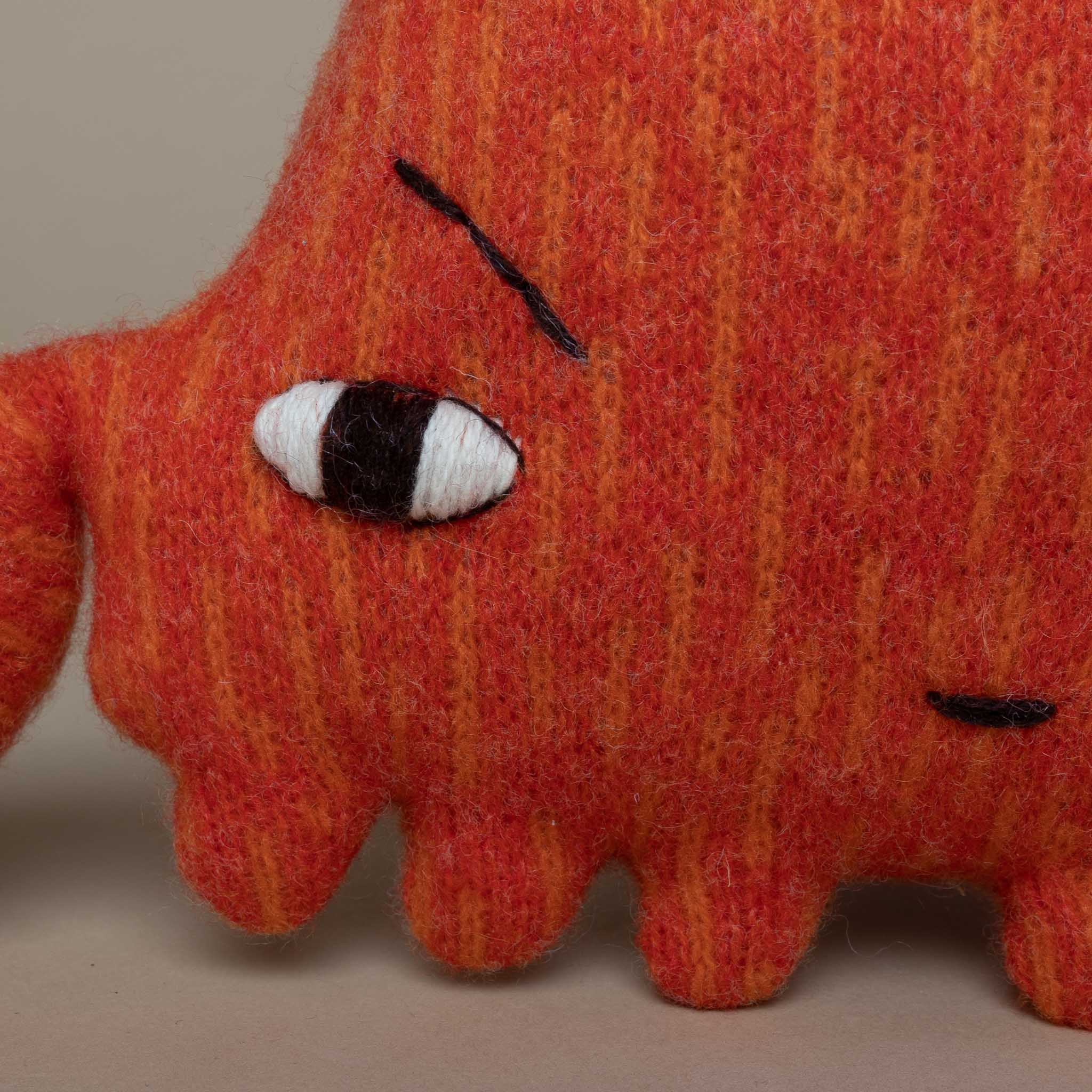 detail-of-knit-and-embroidered-face