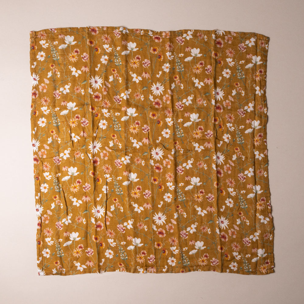 bamboo-burpie-set-wildflowers Floral patterned fabric on a plain background