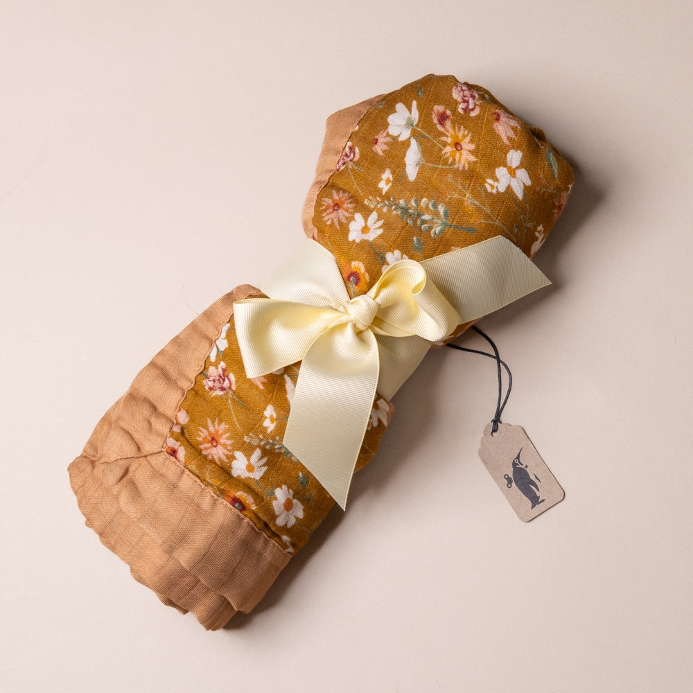 Floral-patterned big-lovie-wildflower  with a bow and tag on a beige background