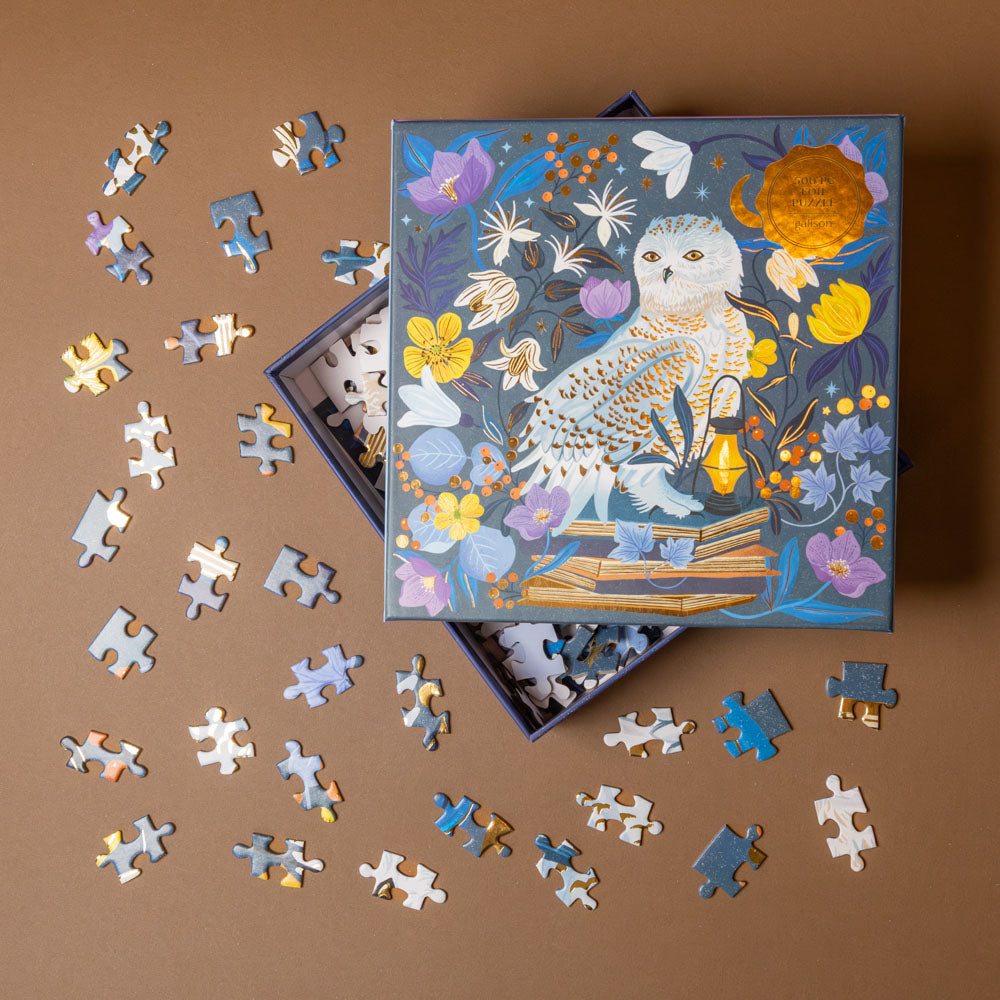 celestial-owl-500-piece-puzzle with owl and floral design on a brown background