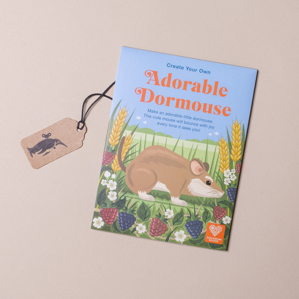 Book titled 'Create Your Own Adorable Dormouse' with a mouse illustration on a beige background