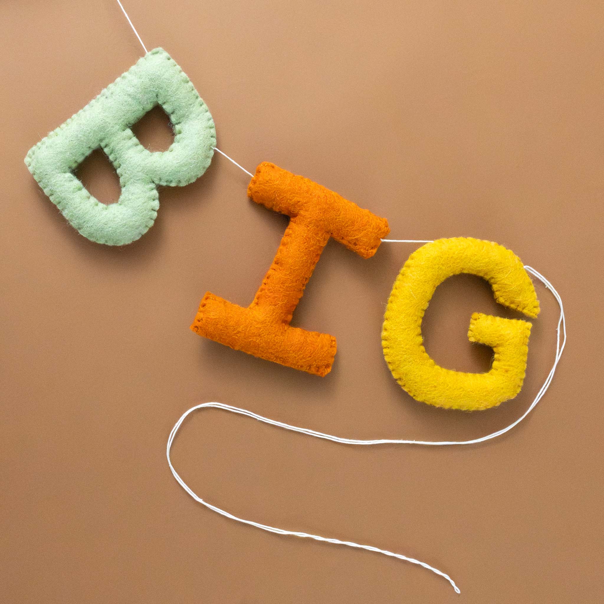 felted-big-garland-rainbow-colored