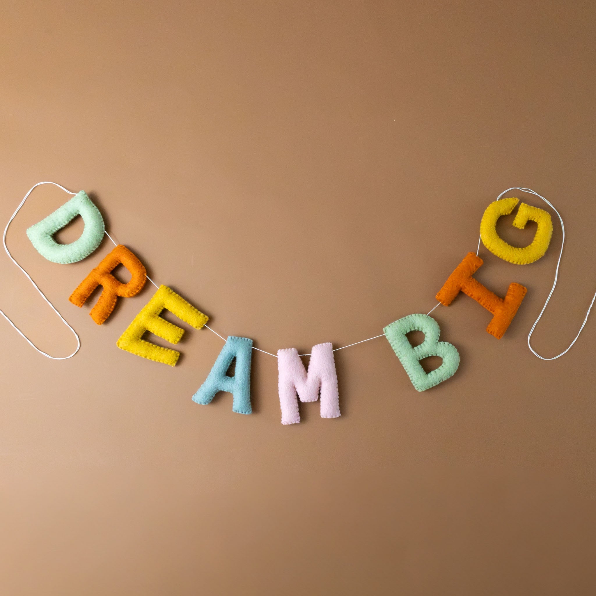 felted-dream-garland-rainbow-colored
