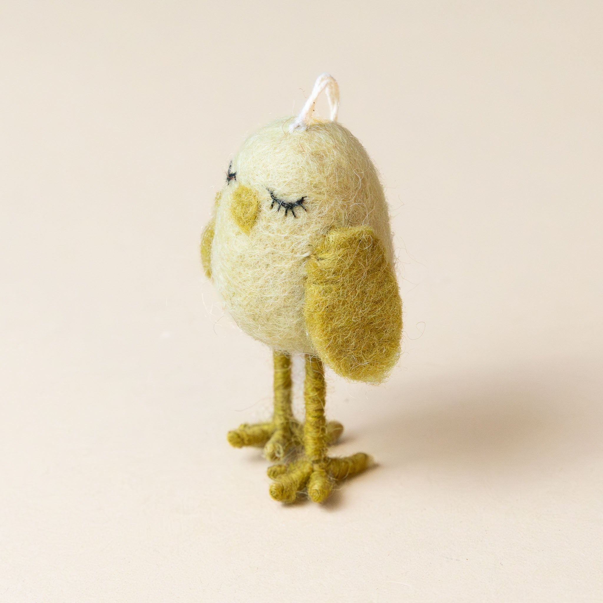 felted-dreamy-chicken-ornament-yellow-side