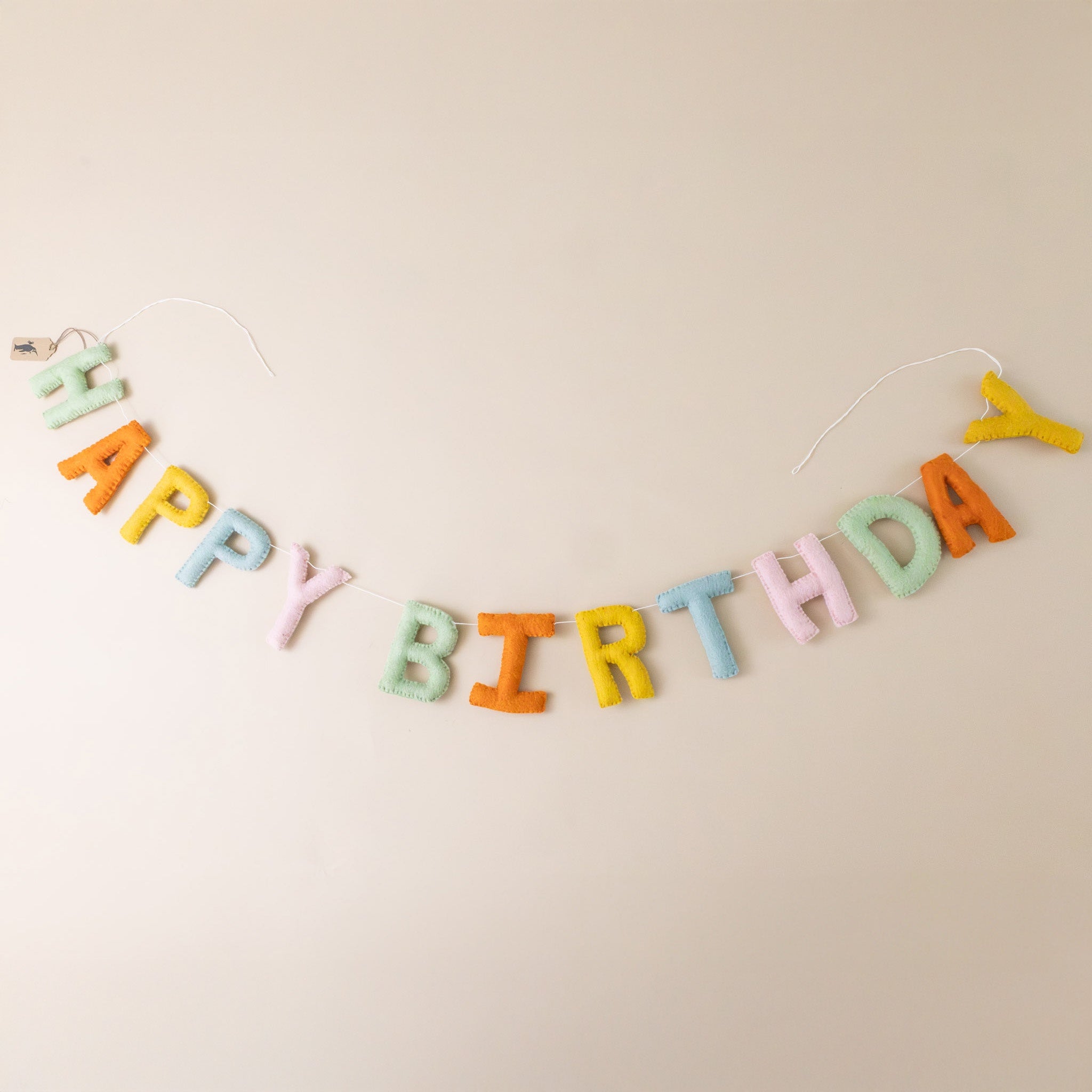 felted-happy-birthday-garland-muted-rainbow-colored