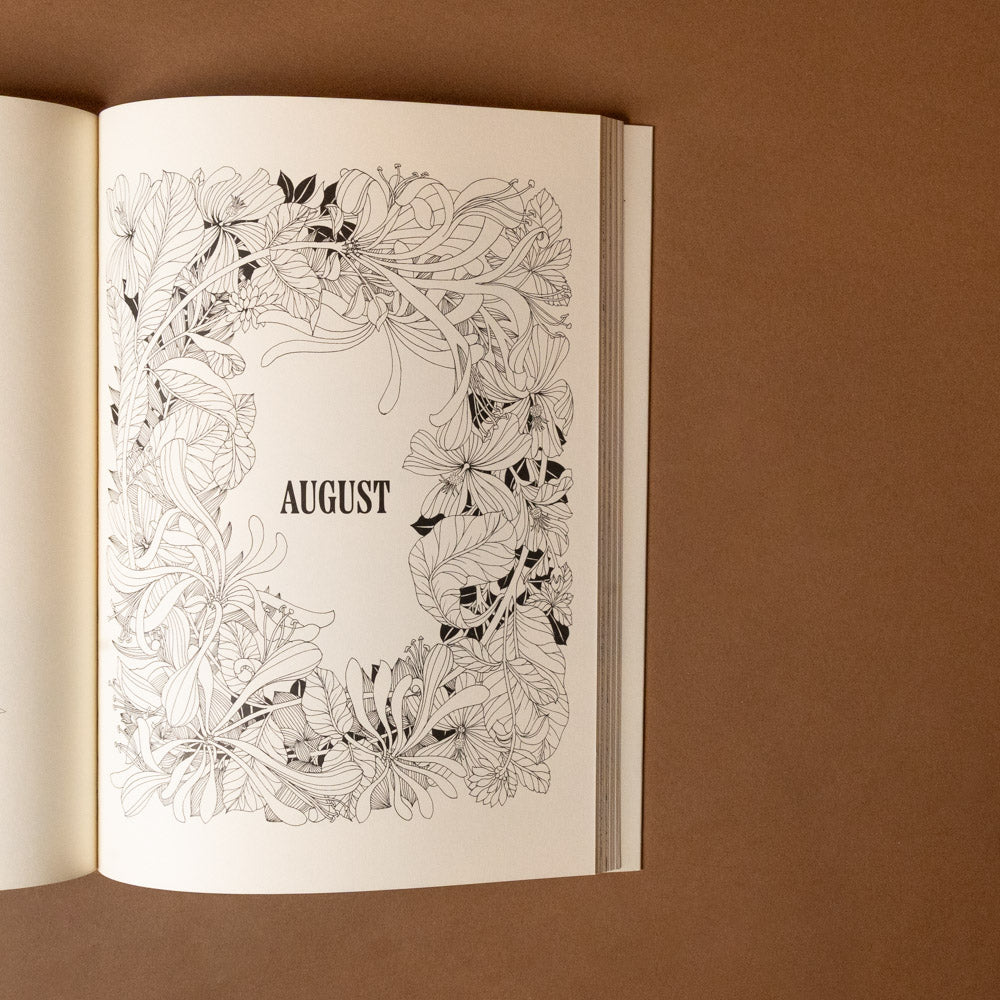 floribunda-year-a-flower-coloring-companion Open book with a floral design and 'August' text on a brown background