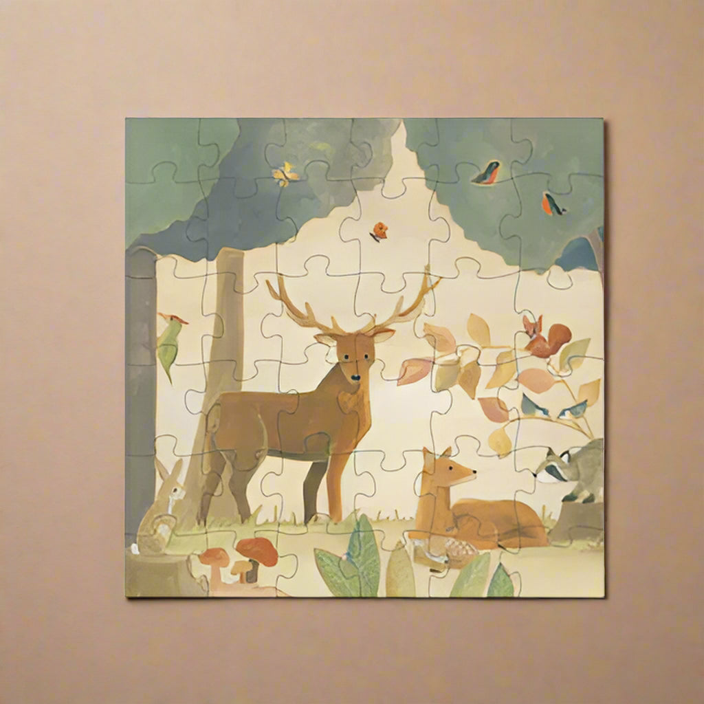forest-36-piece-puzzle with a deer and forest scene on a white background