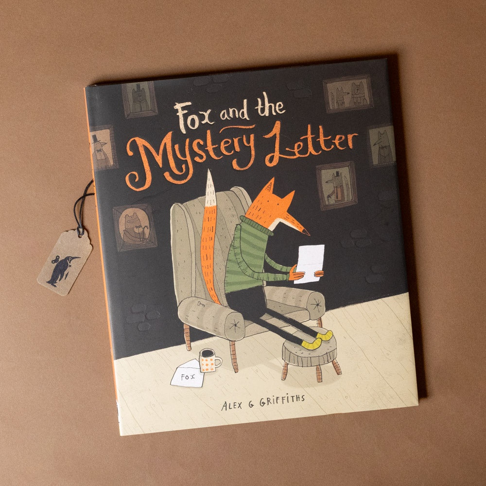 Book titled 'Fox and the Mystery Letter' with a fox character on the cover, sitting in a chair reading a letter.