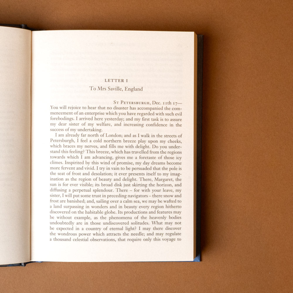 frankenstein Open book titled letter 1 with text on a brown background