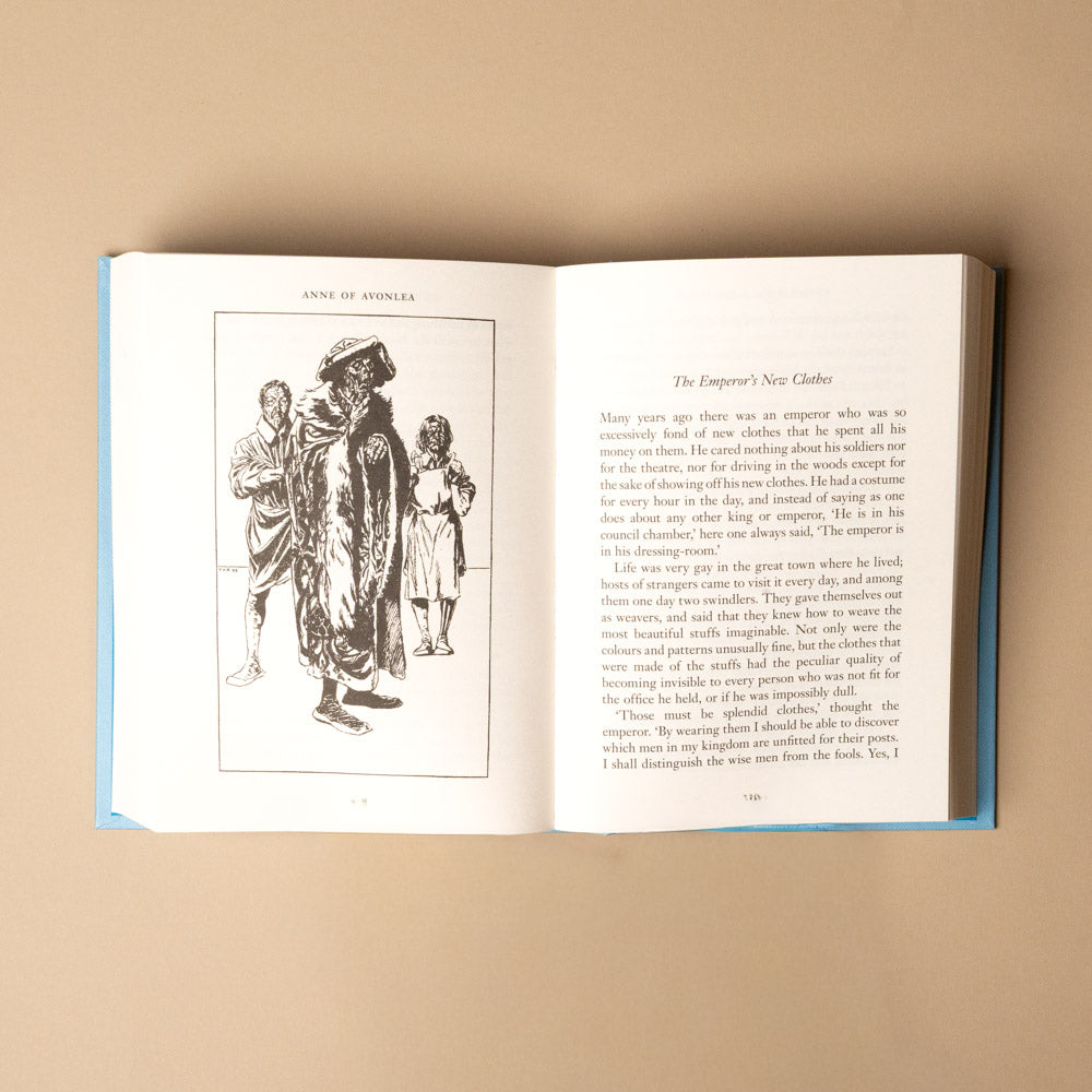 hans-christian-andersen-fairy-tales Open book with illustrations and text on a beige background