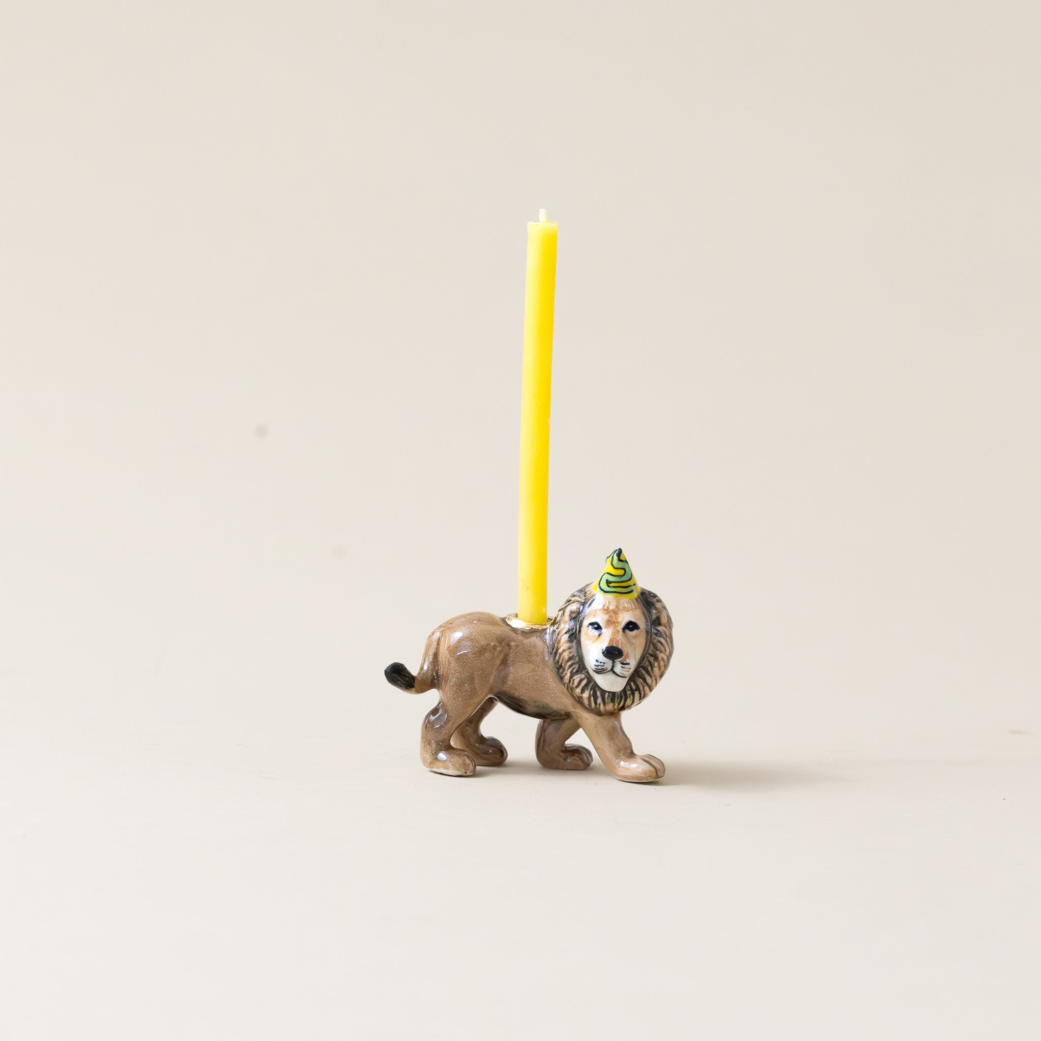 heirloom-porcelain-cake-topper-lion-with-candle