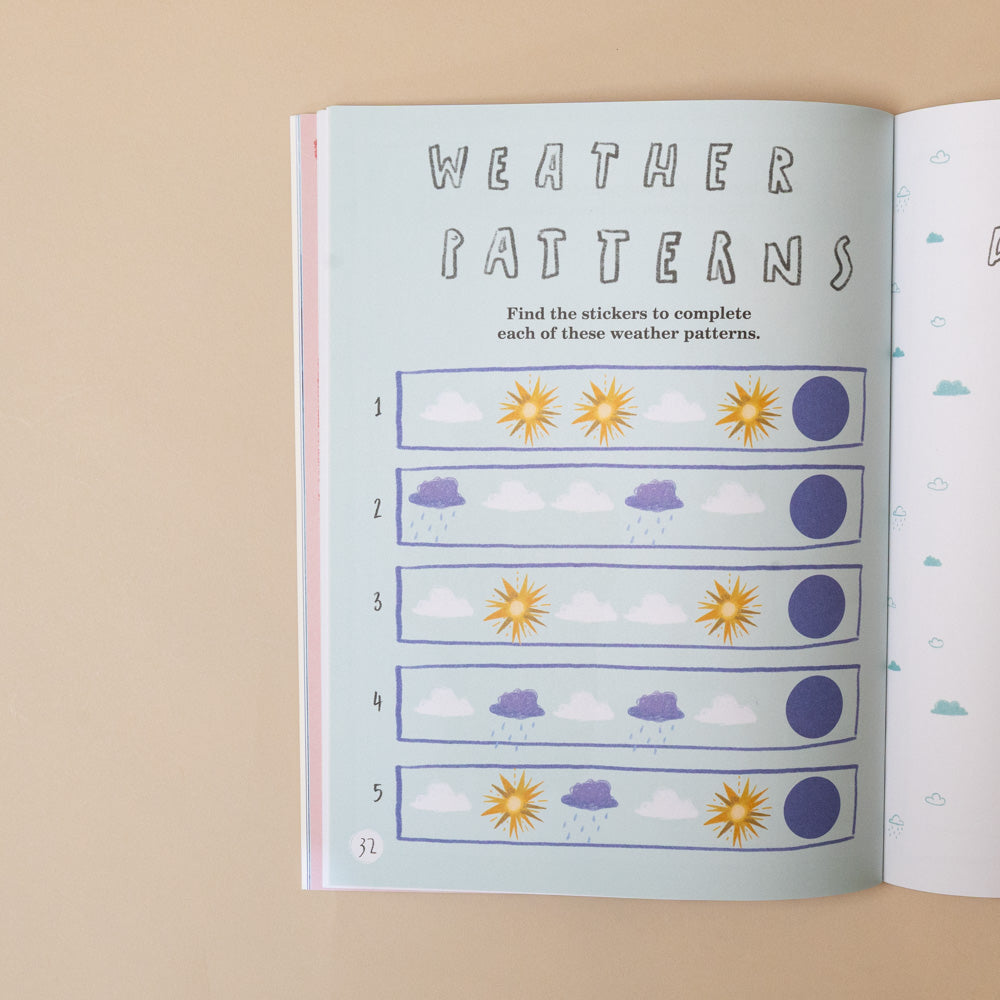 here-we-are-activity-book Open book with a weather patterns activity on a beige background