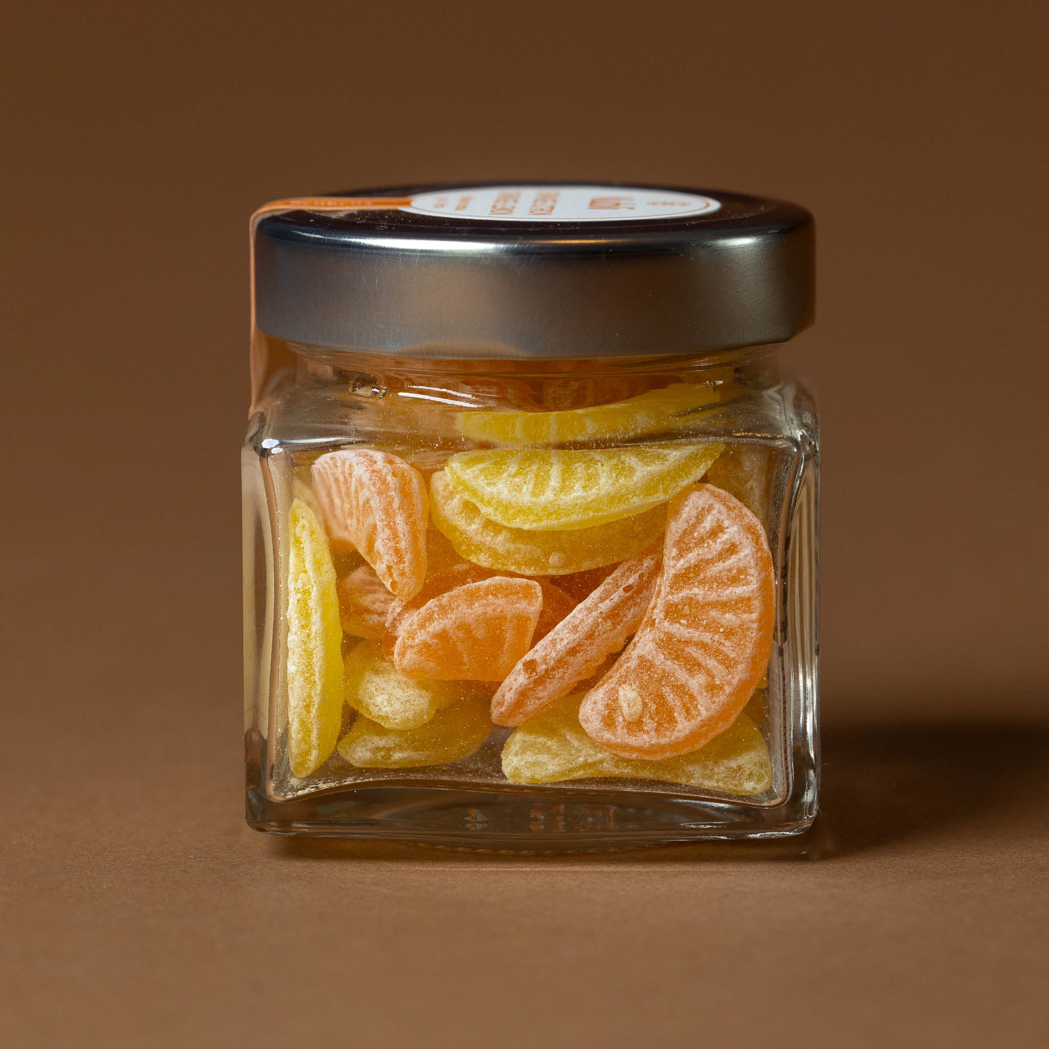 kubli-orange-citron-hard-candies-in-glass-jar