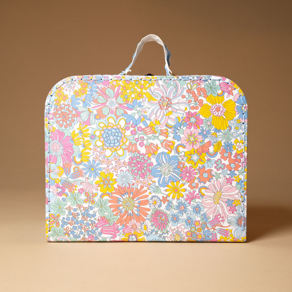 liberty-suitcase-large Floral patterned bag on a beige background