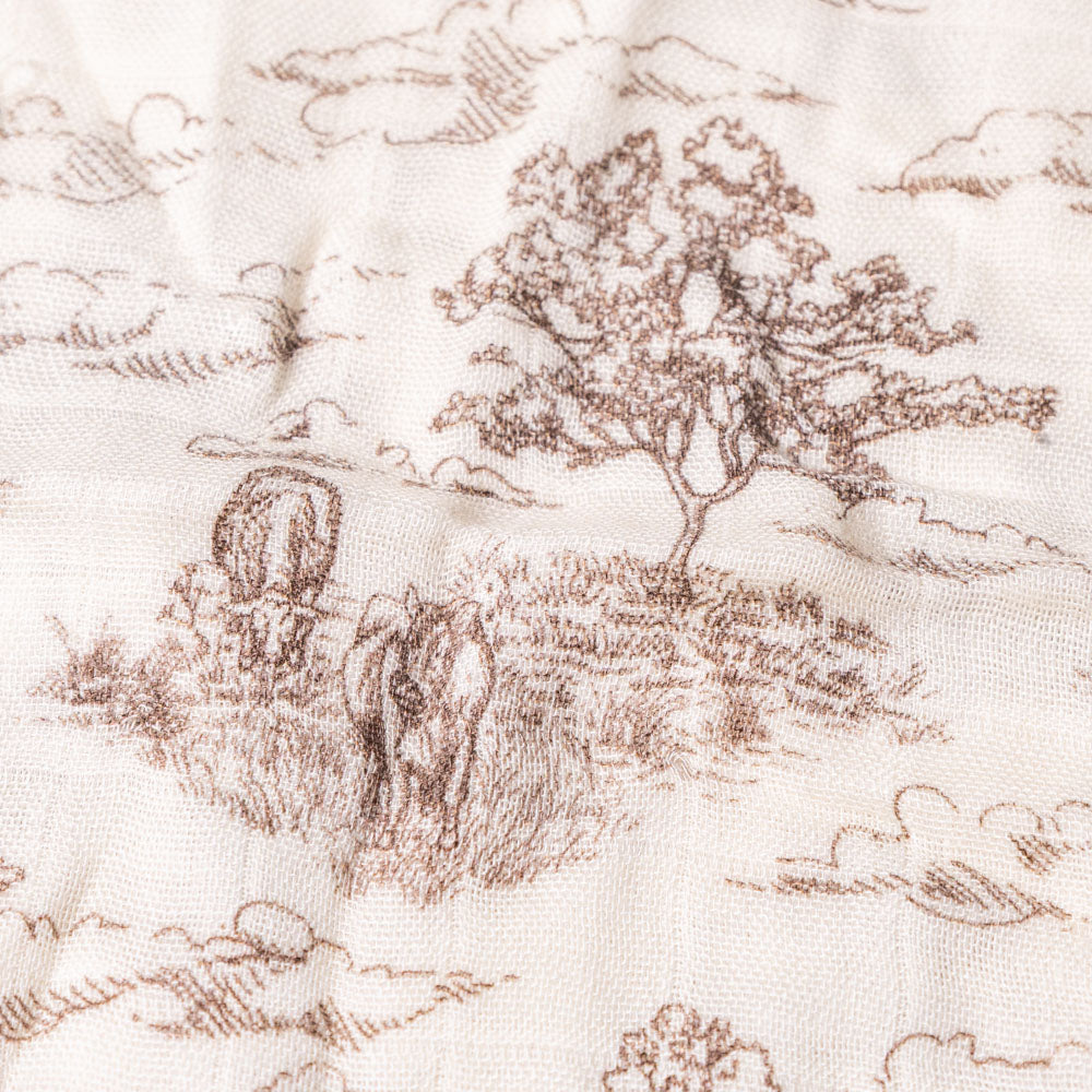 little-lovie-meadow-toile Fabric with brown landscape pattern on a white background
