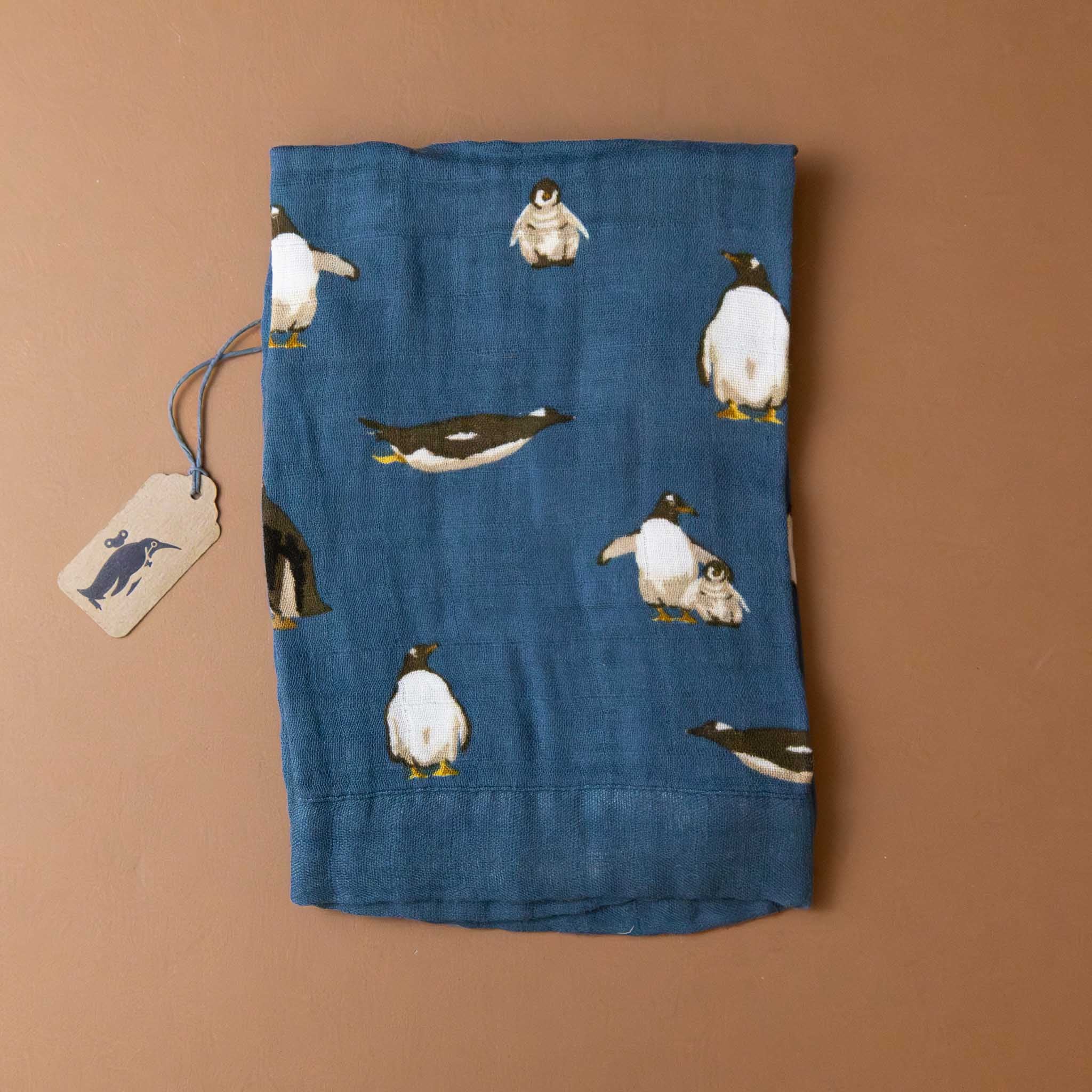 little-lovie-penguins-blue-background