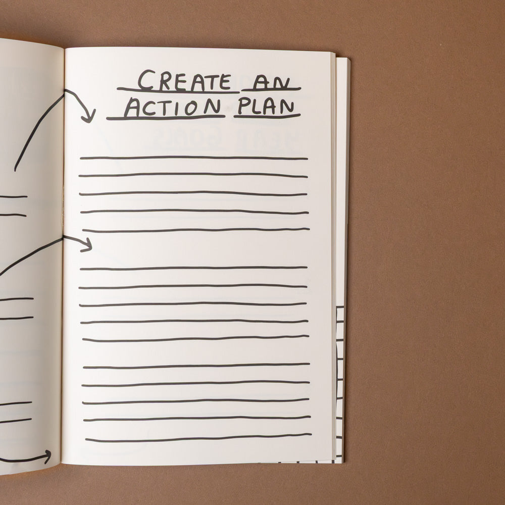 make-it-happen-journal-despite-being-really-scared Notebook page with 'Create an Action Plan' text and lined sections on a brown background