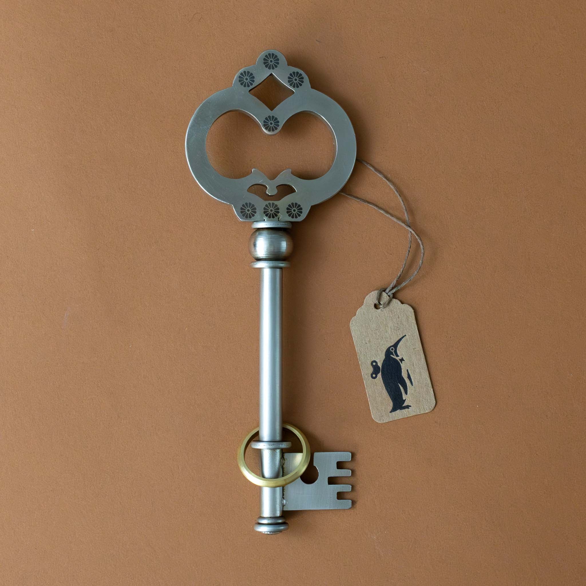 metal-key-to-the-answers-puzzle-with-gold-ring