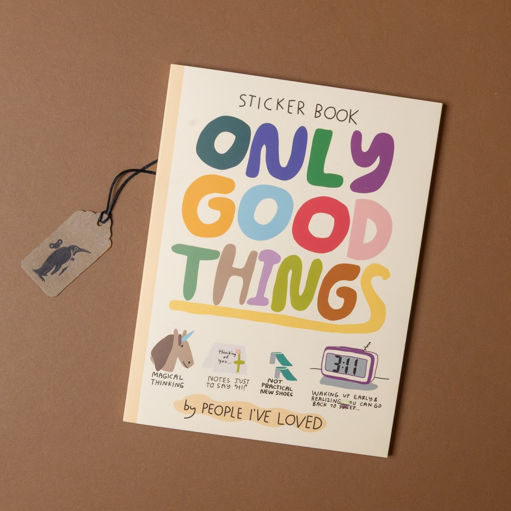 Sticker book titled 'Only Good Things' on a brown background