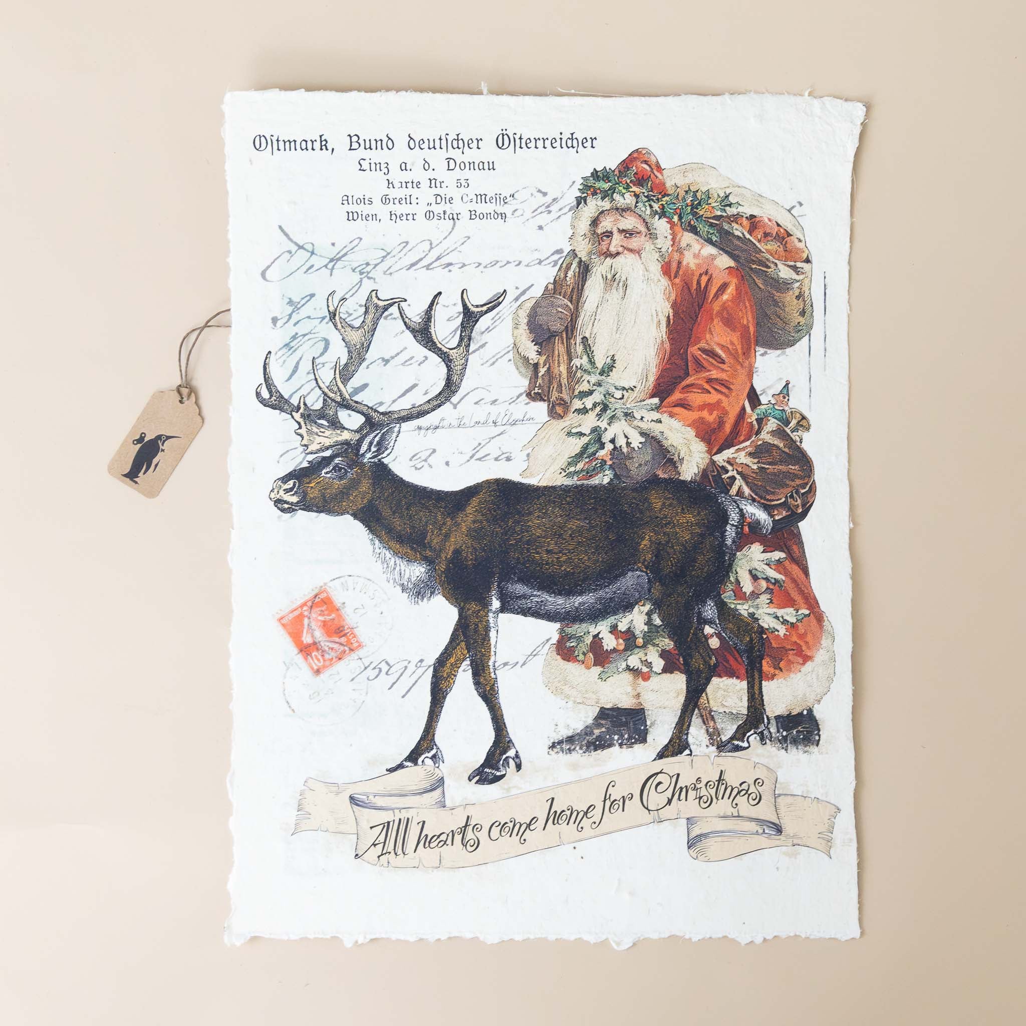 paper-print-home-for-christmas-image-of-santa-with-presents-and-deer-with-script