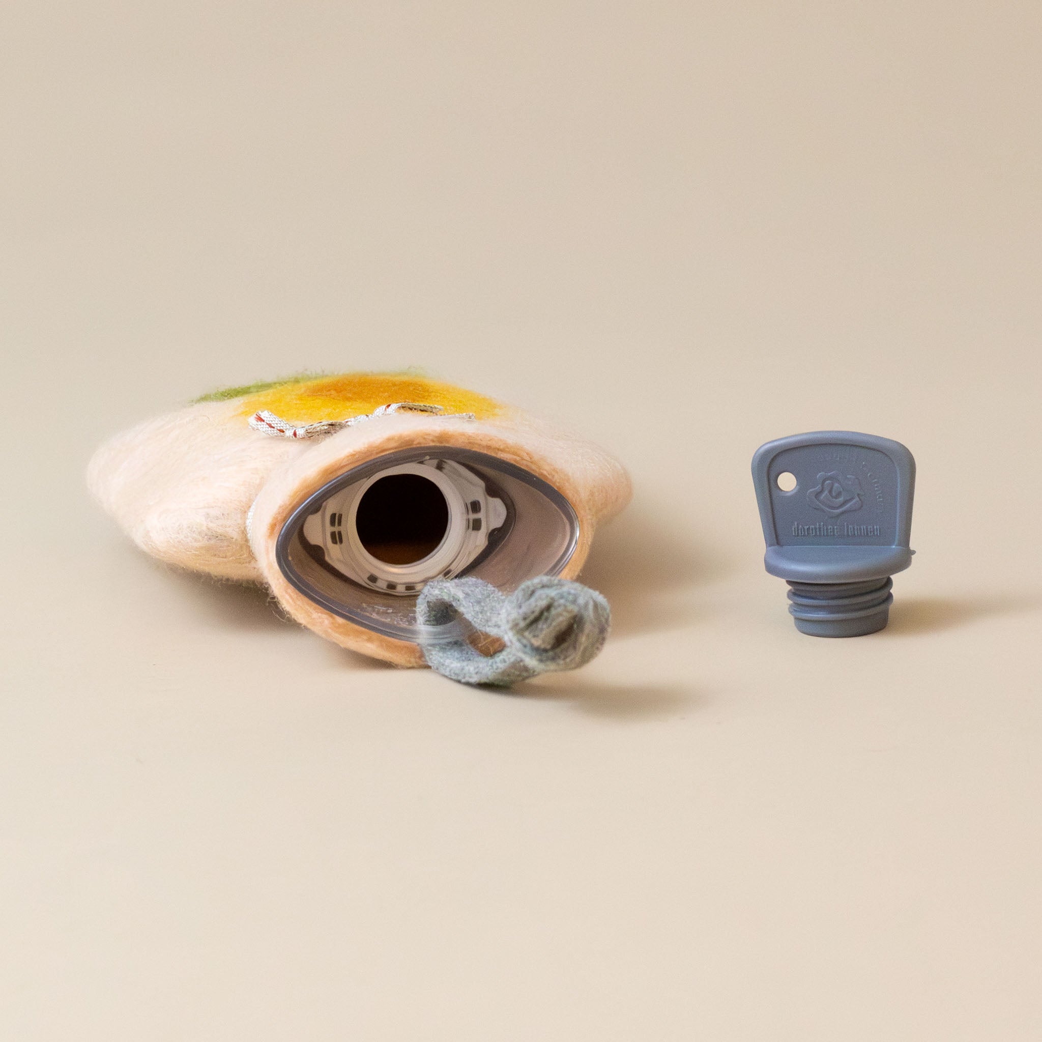 petite-felted-wool-hot-water-bottle-rosy-sunflower-screw-cap-off