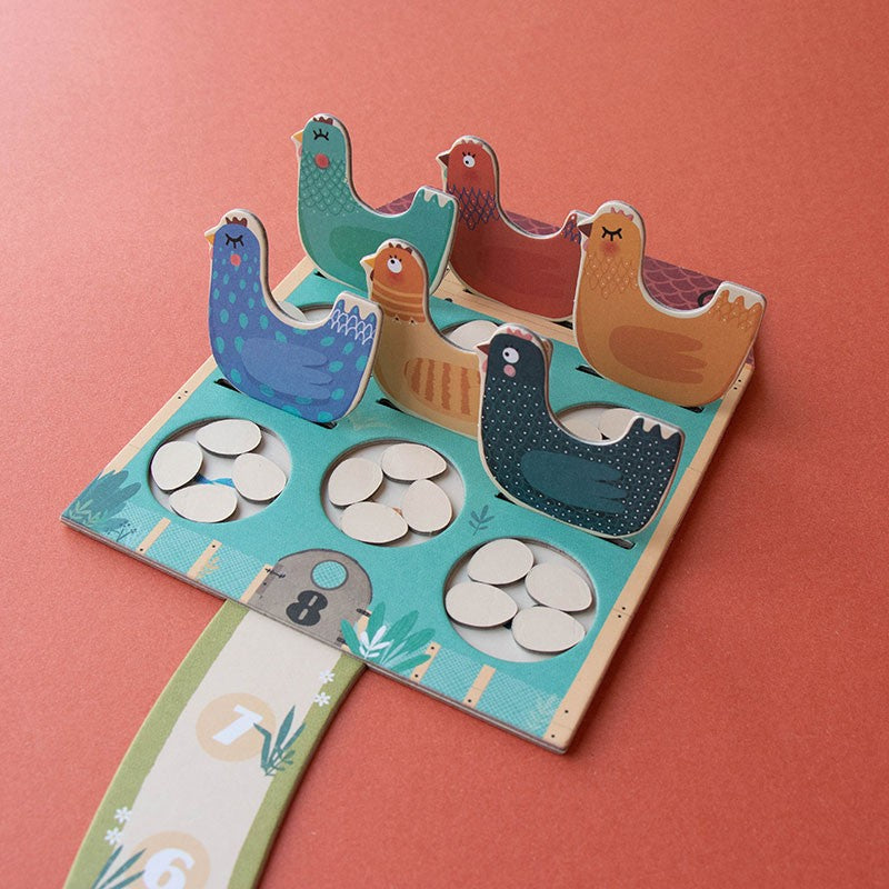 pocket-game-cluck-cluck-the-fox-eggs-chickens-board-game pieces