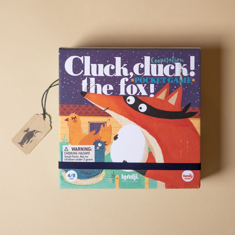 pocket-game-cluck-cluck-the-fox Board game box titled 'Cluck, cluck! the fox!' on a beige background