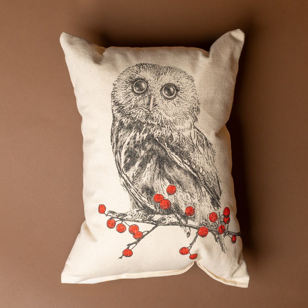red-berry-owl-pillow Pillow with an owl and berry design on a brown background