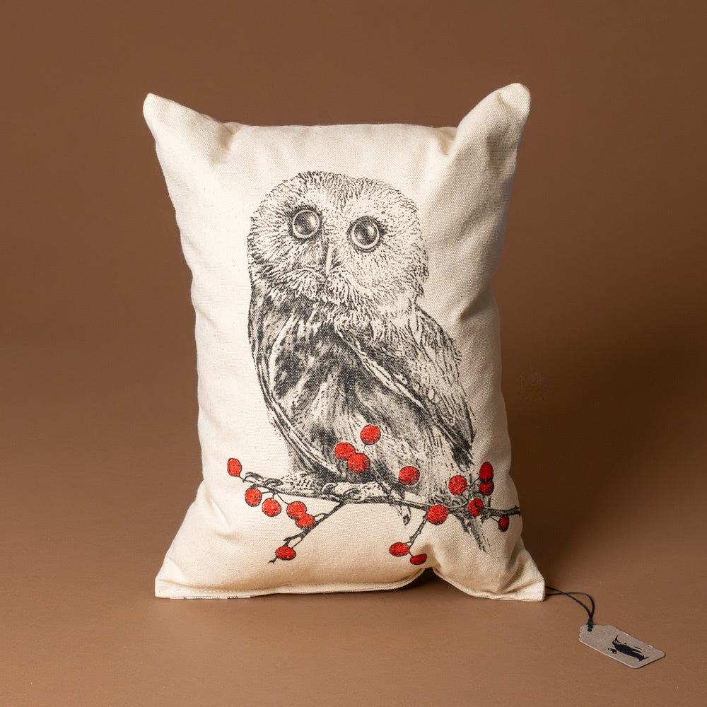 red-berry-owl-pillow Decorative pillow with an owl and berries design on a brown background