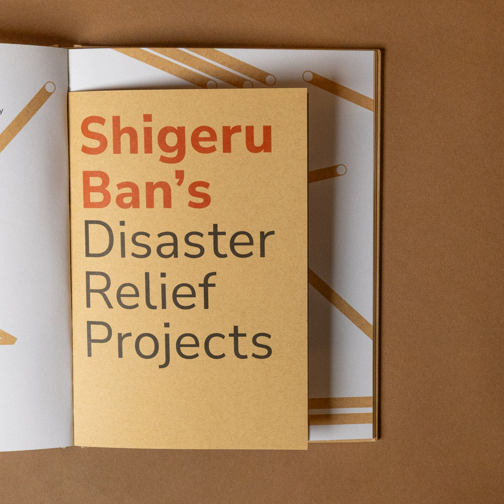 shigeru-ban-build-a-better-world Book titled 'Shigeru Ban's Disaster Relief Projects' on a brown background